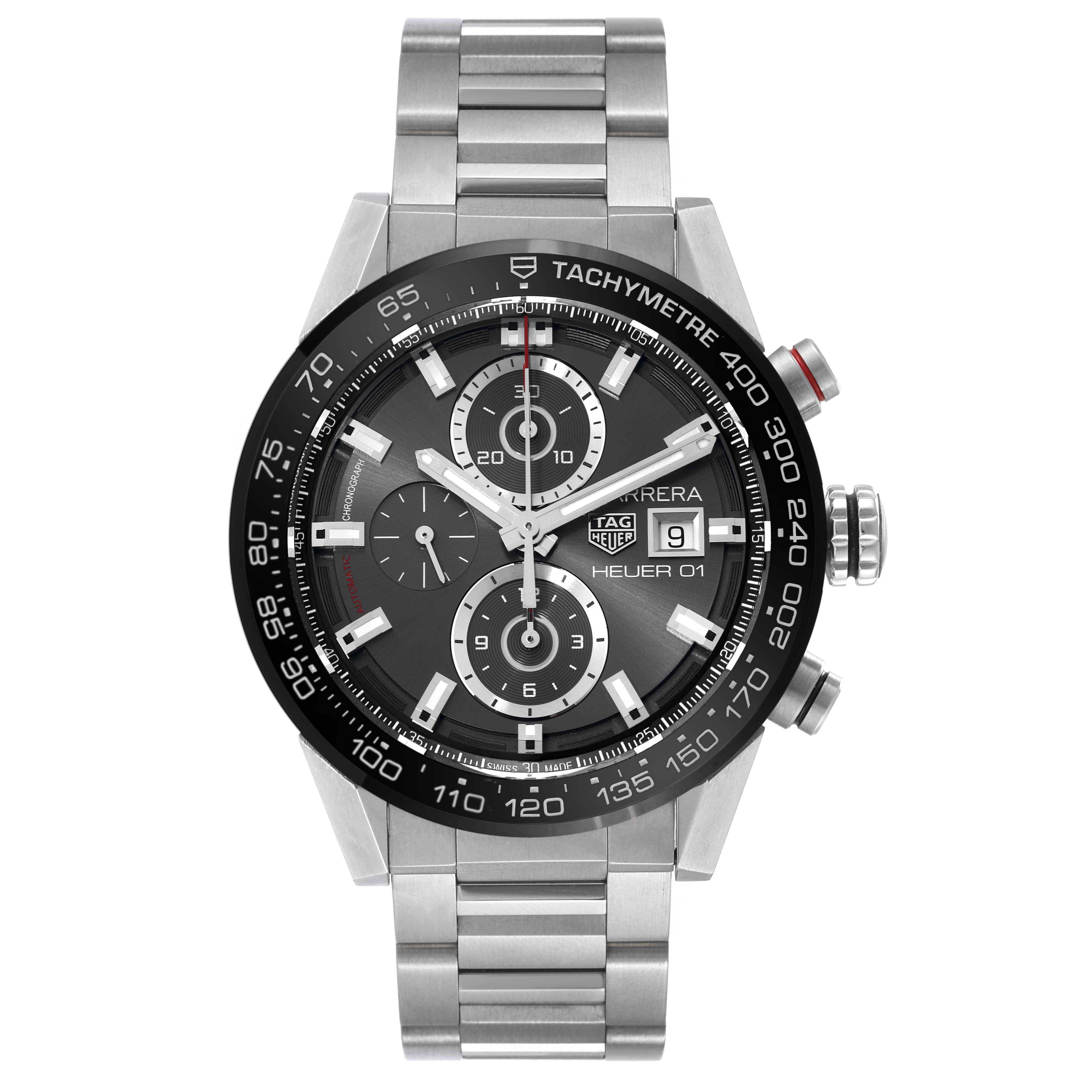 The image shows a front view of the Carrera model by Tag Heuer, displaying its dial, tachymeter bezel, and stainless steel bracelet.