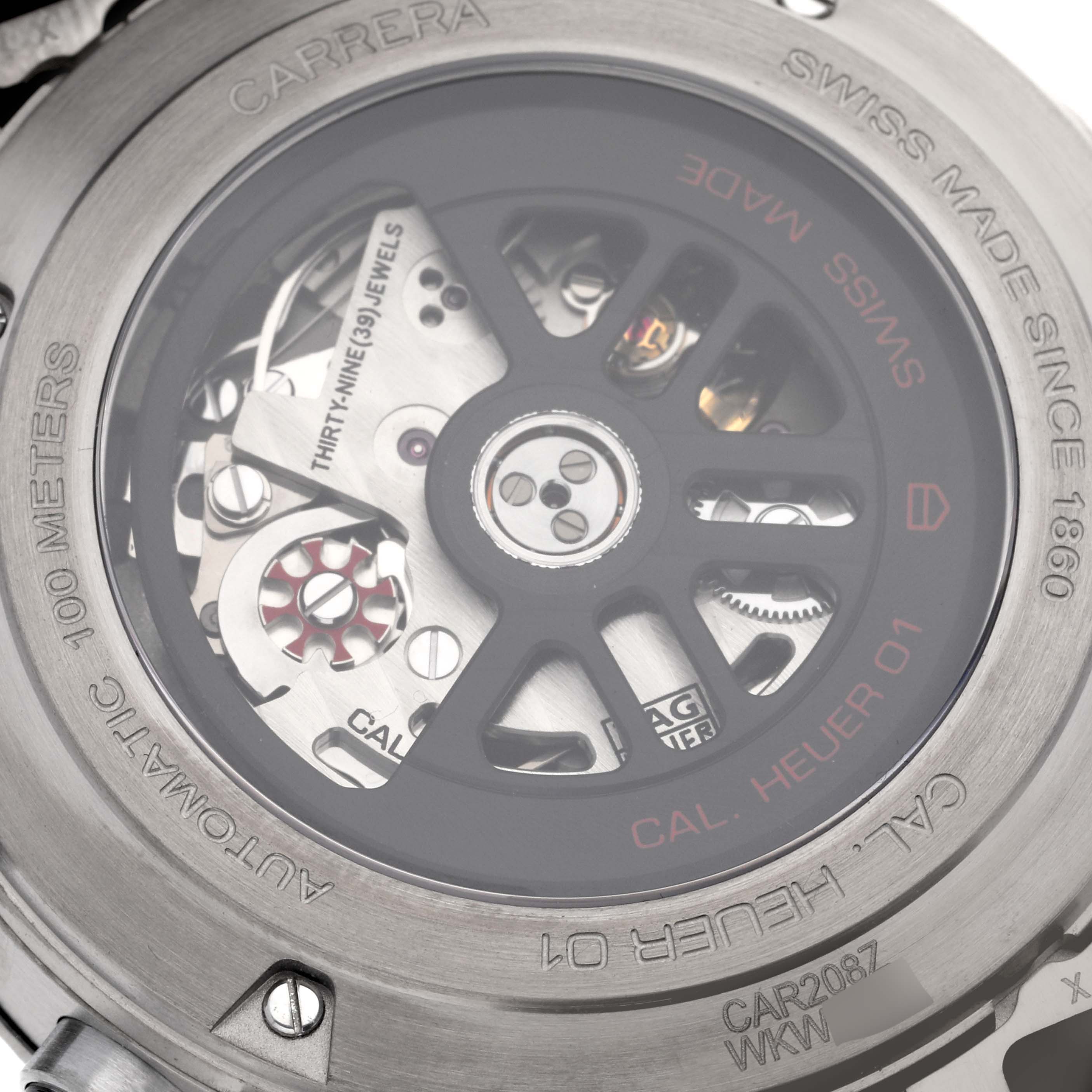 The image shows the back view of a Tag Heuer Carrera CAR208Z.FT6046 Men's Stainless Steel Grey Dial CAR208Z.FT6046 Men's Stainless Steel Grey Dial watch, revealing its intricate automatic movement and rotor.