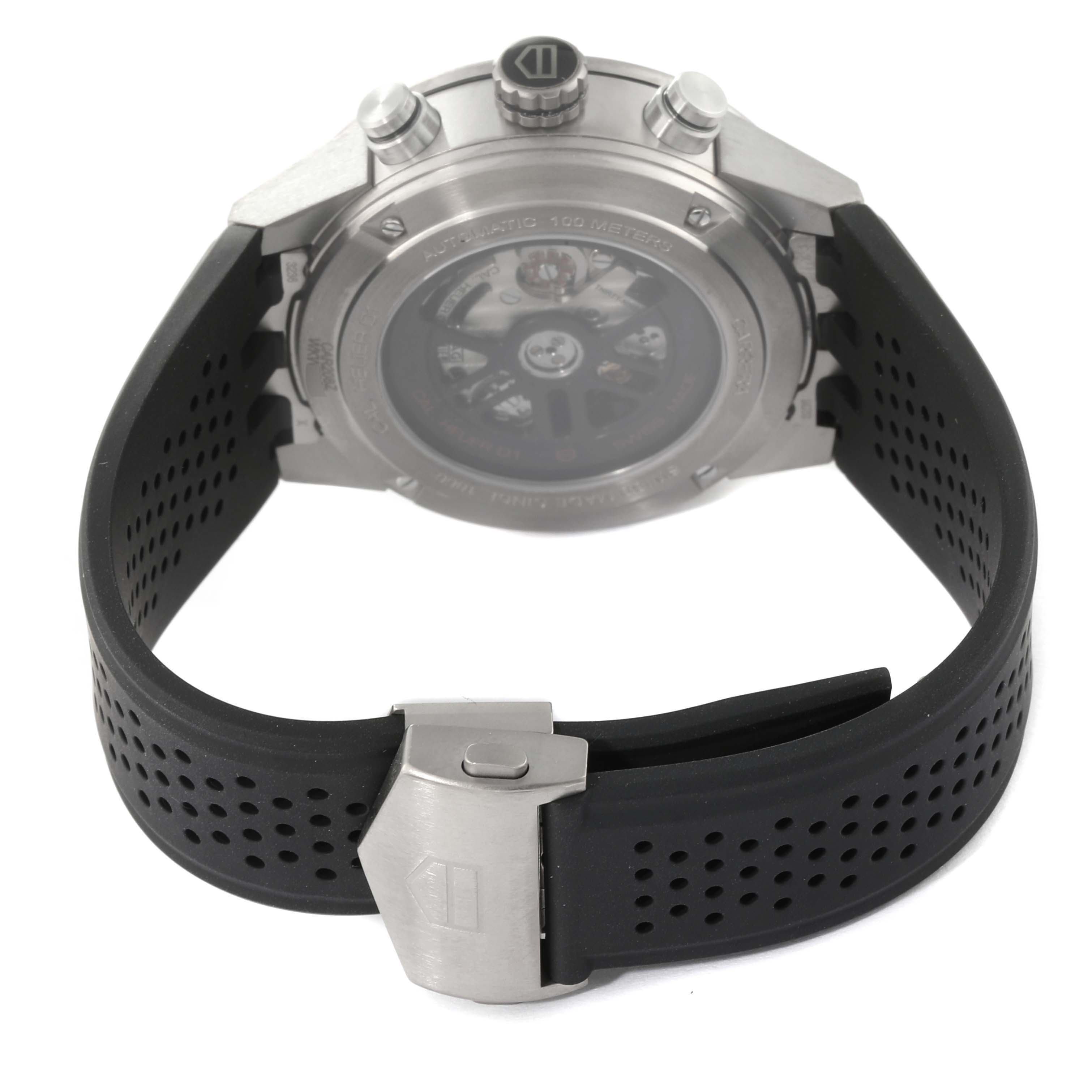 The image shows the back view of a Tag Heuer Carrera CAR208Z.FT6046 Men's Stainless Steel Grey Dial CAR208Z.FT6046 Men's Stainless Steel Grey Dial watch, highlighting its black perforated strap and clasp.