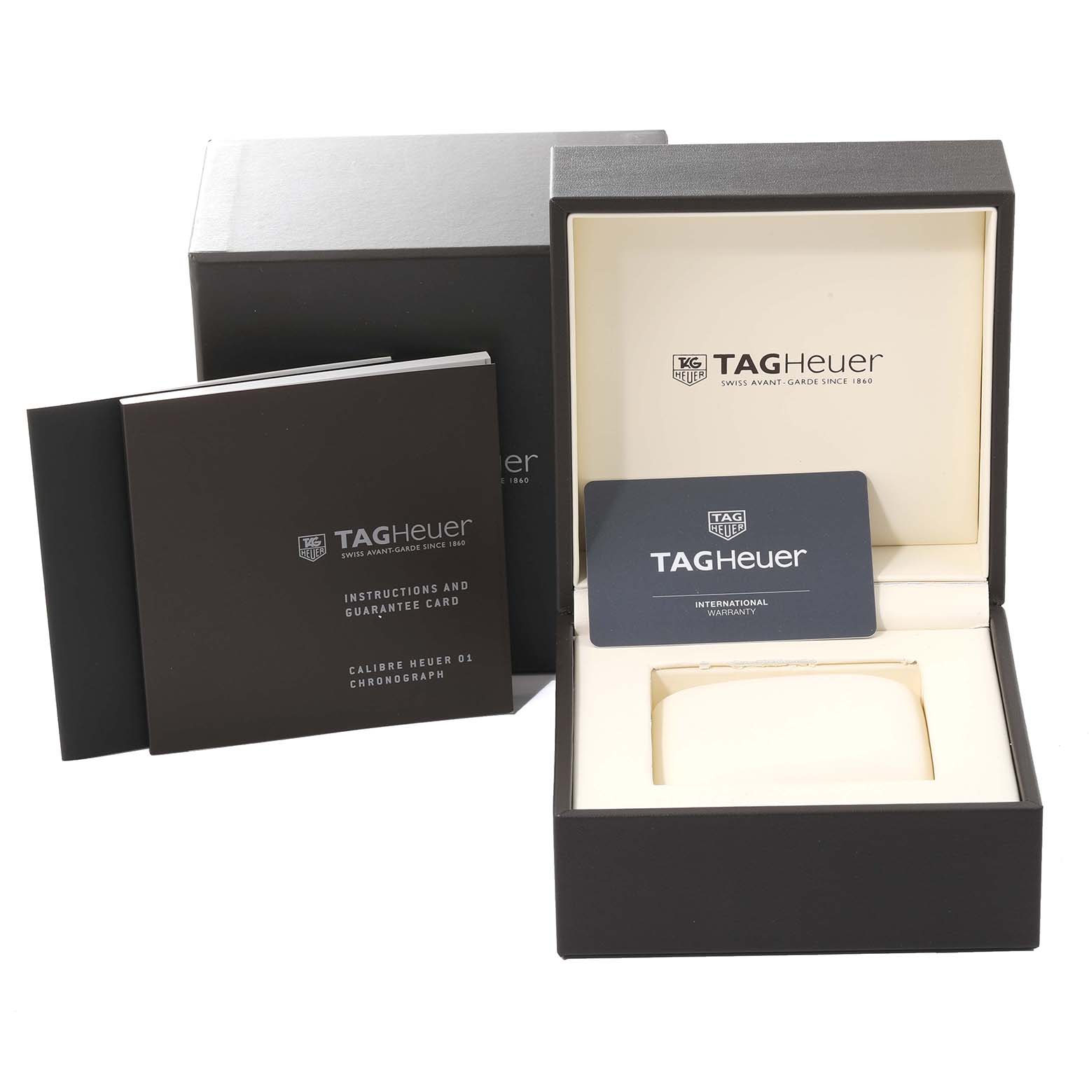 This image shows the packaging, instruction manual, and warranty card for the Tag Heuer Carrera CAR208Z.FT6046 Men's Stainless Steel Grey Dial CAR208Z.FT6046 Men's Stainless Steel Grey Dial model watch.