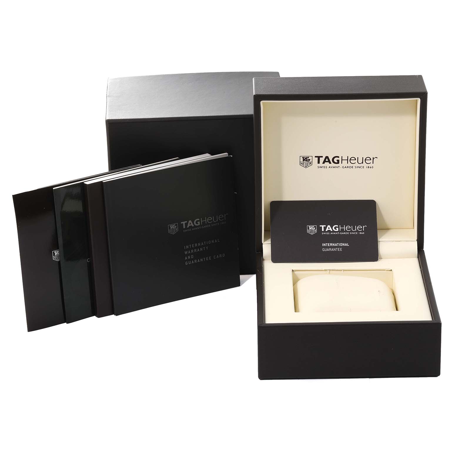 The image shows the original packaging, warranty booklets, and the international guarantee card for the Tag Heuer Carrera CV201P Men's Stainless Steel Mother of Pearl Dial CV201P Men's Stainless Steel Mother of Pearl Dial model.