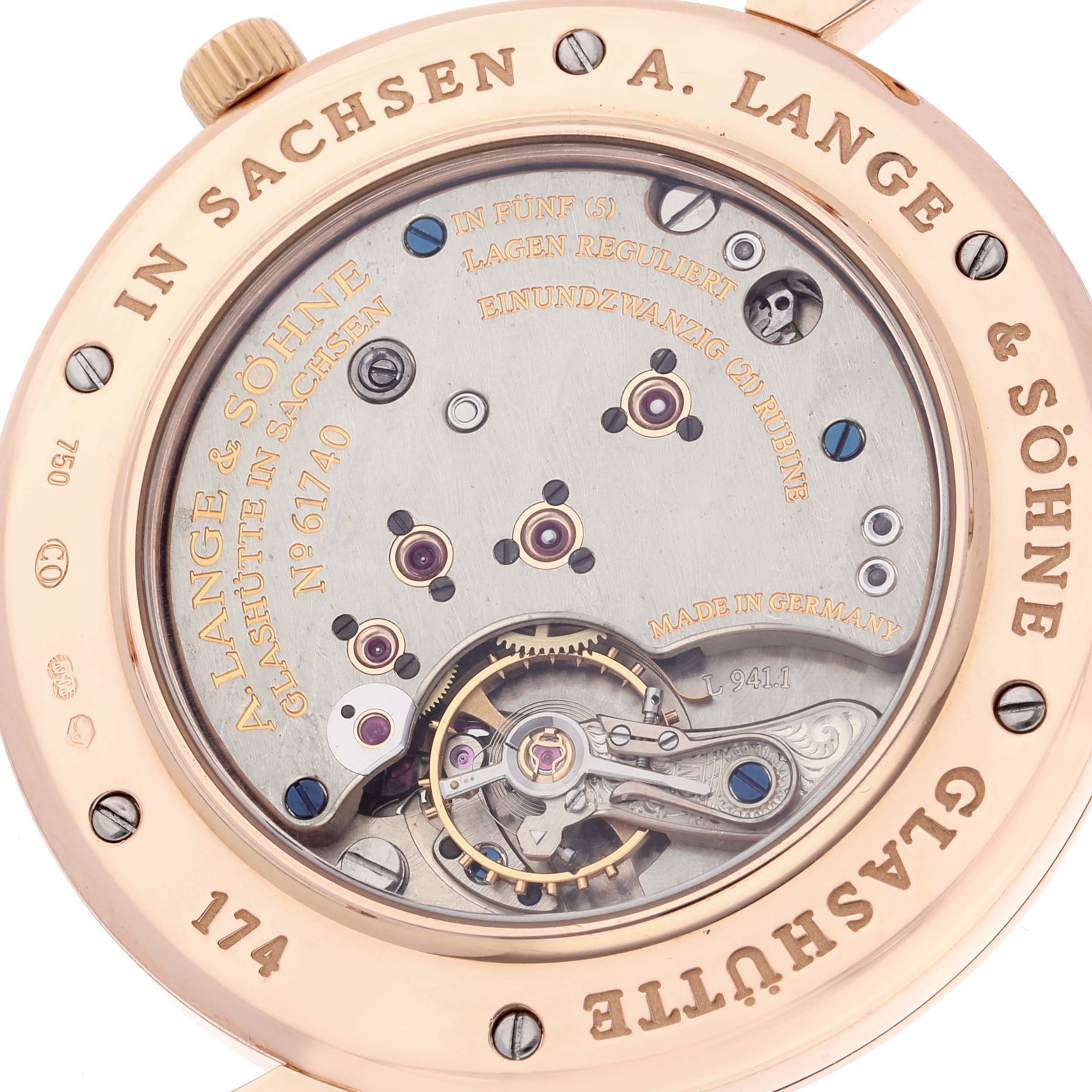 The image shows the back view of the A. Lange & Sohne Saxonia 215.032 Men's Rose Gold Silver Dial watch, displaying its intricate movement and internal components.