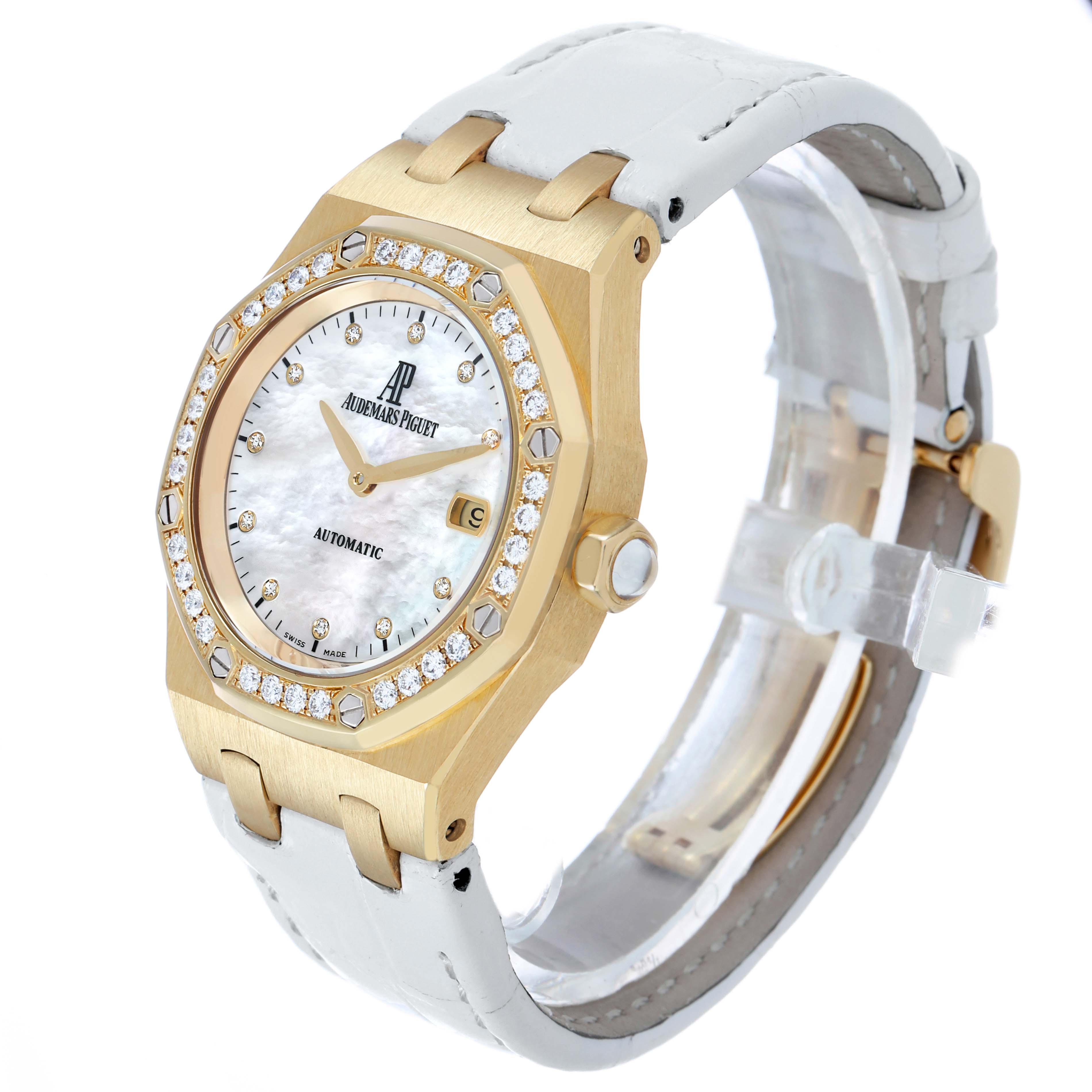 The Audemars Piguet Royal Oak 77321 Women's Yellow Gold Mother of Pearl Dial is shown at an angle highlighting the front, bezel, and strap, emphasizing its gold and diamond accents.