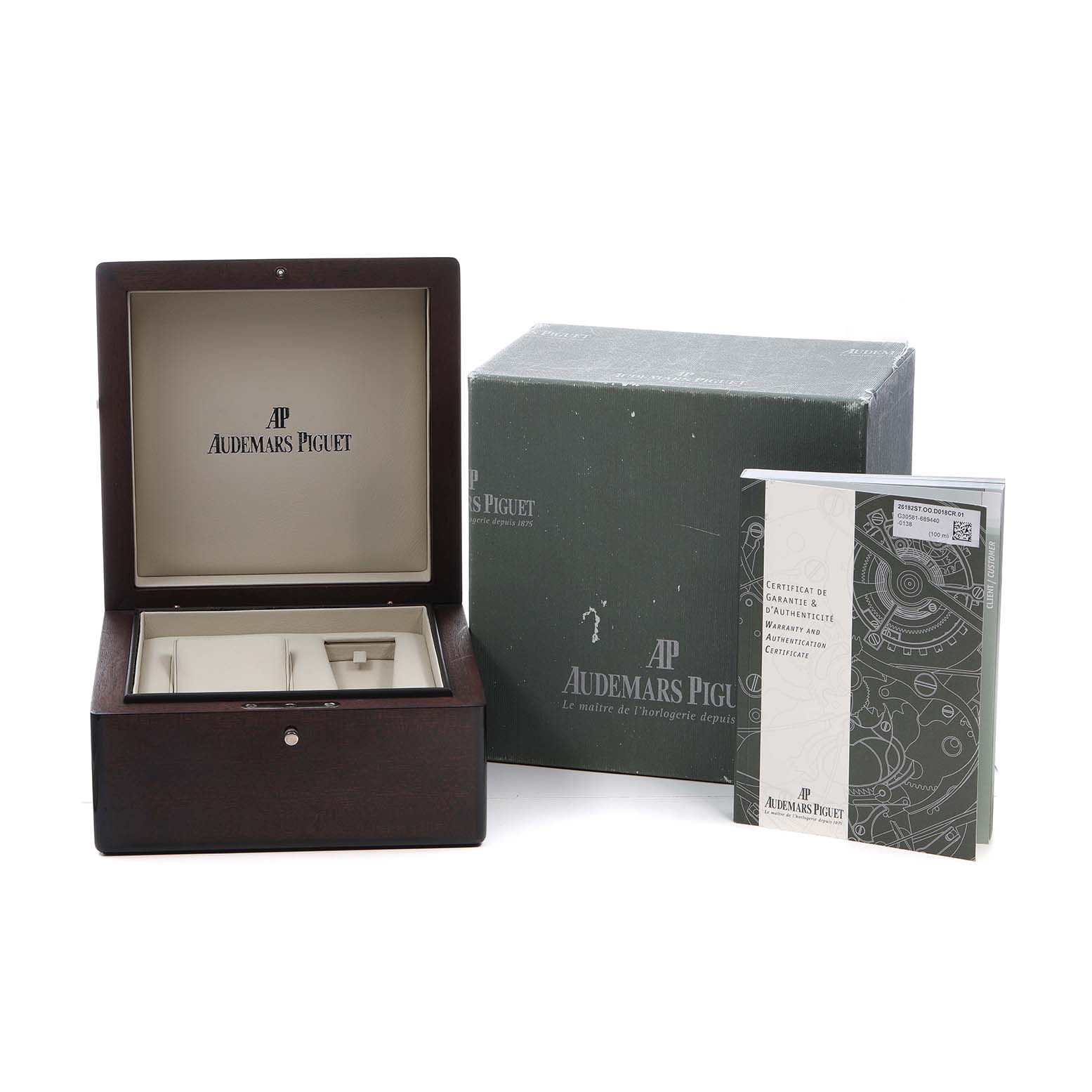 The image shows the packaging and authenticity certificates for the Audemars Piguet Royal Oak Offshore 26182ST Men's Stainless Steel White Dial model.