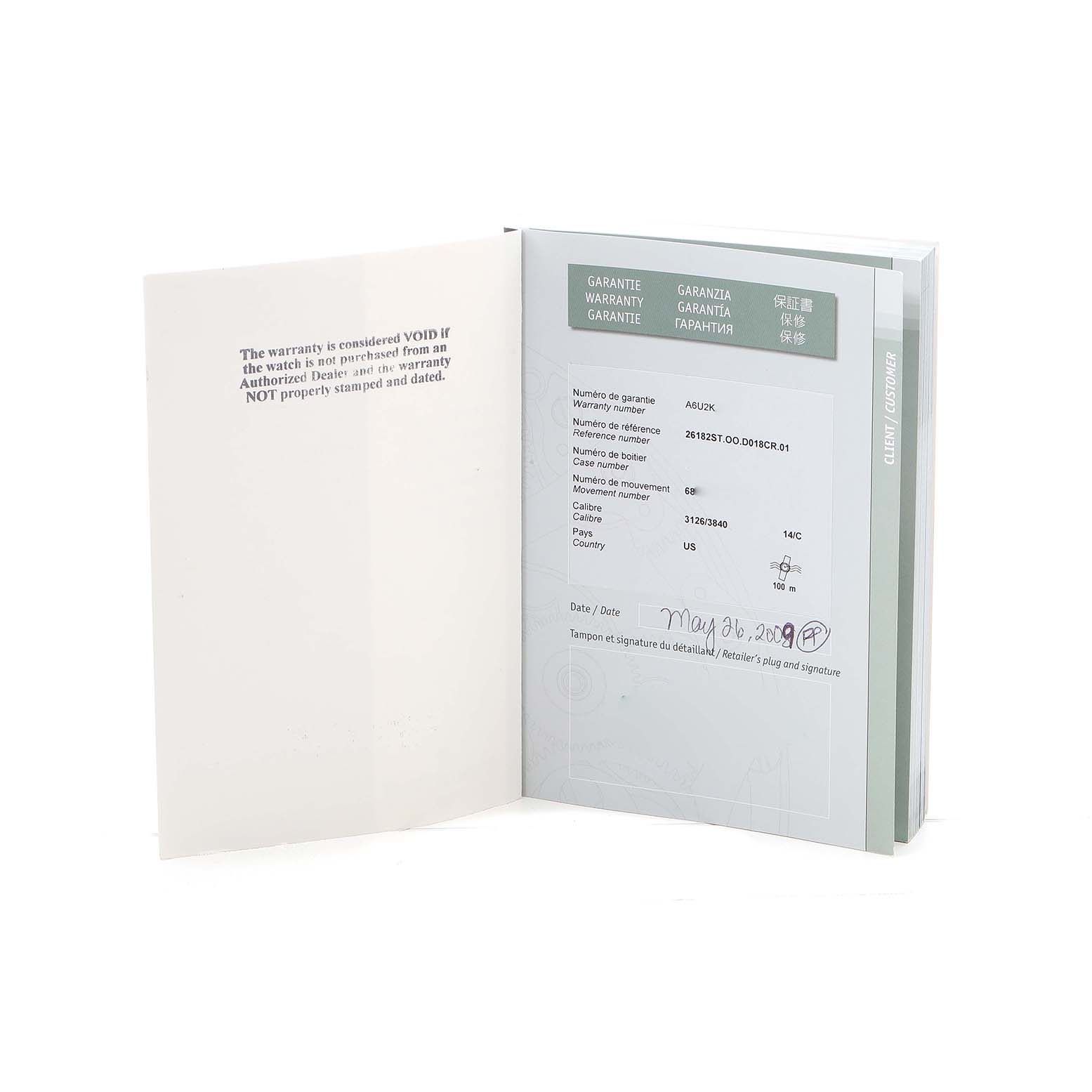 The image shows the warranty card booklet for the Audemars Piguet Royal Oak Offshore 26182ST Men's Stainless Steel White Dial model.