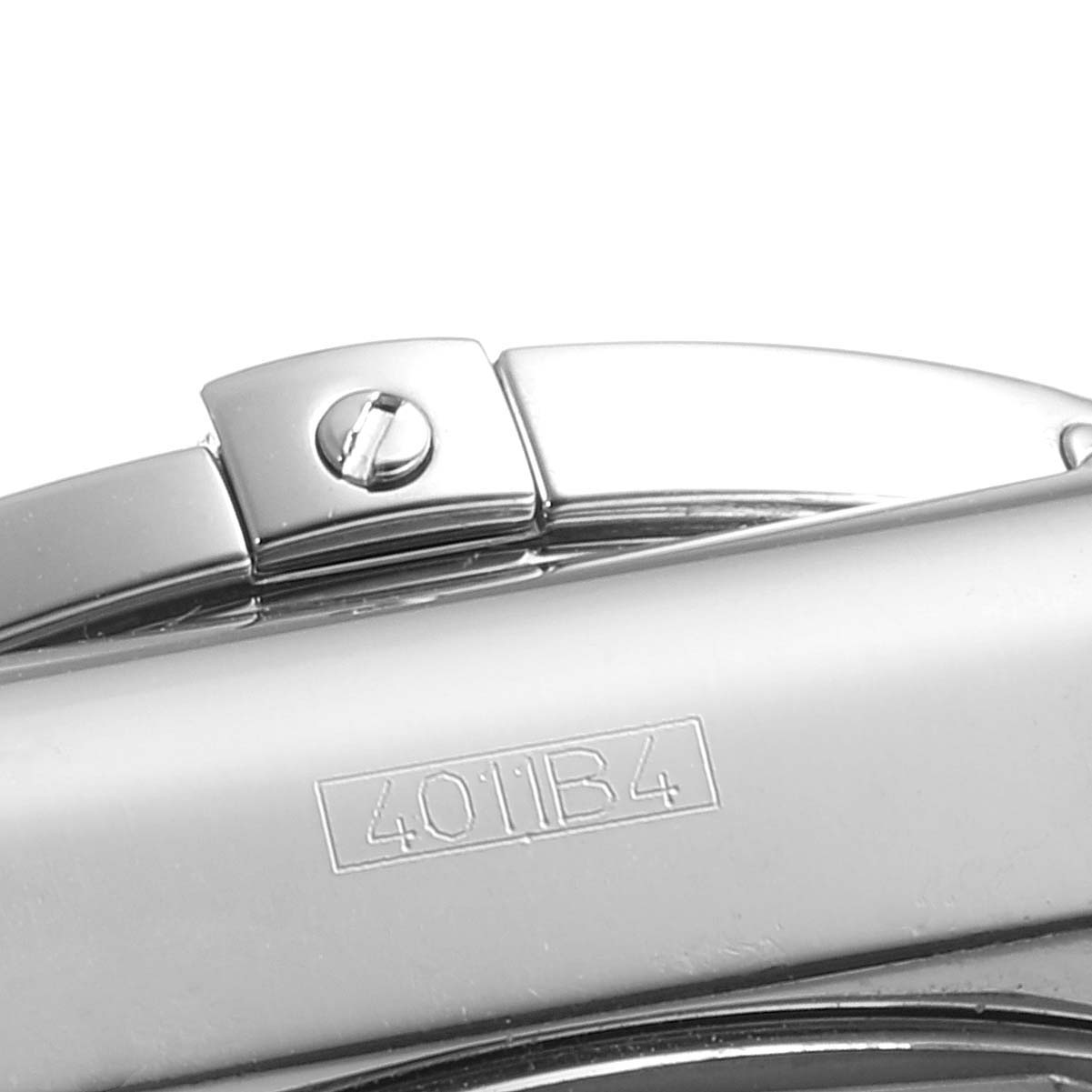 The image shows a close-up of the Breitling Chronomat AB0110 Men's Stainless Steel Black Dial AB0110 Men's Stainless Steel Black Dial watch bracelet and a part of the clasp with a serial number engraved.