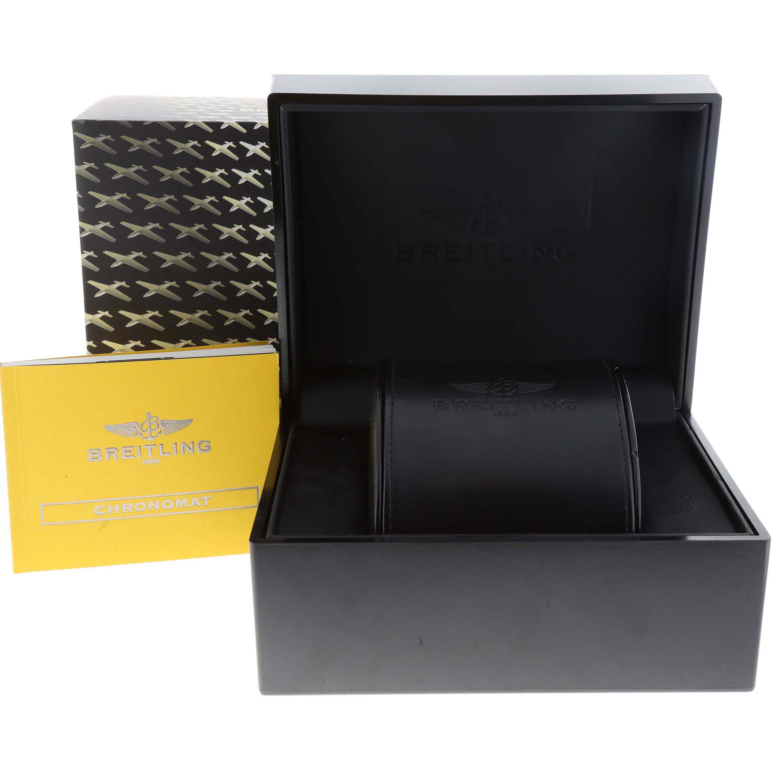 The image shows the packaging and accessories for a Breitling Chronomat AB0110 Men's Stainless Steel Black Dial AB0110 Men's Stainless Steel Black Dial watch, including the box, leather case, and instruction manual.