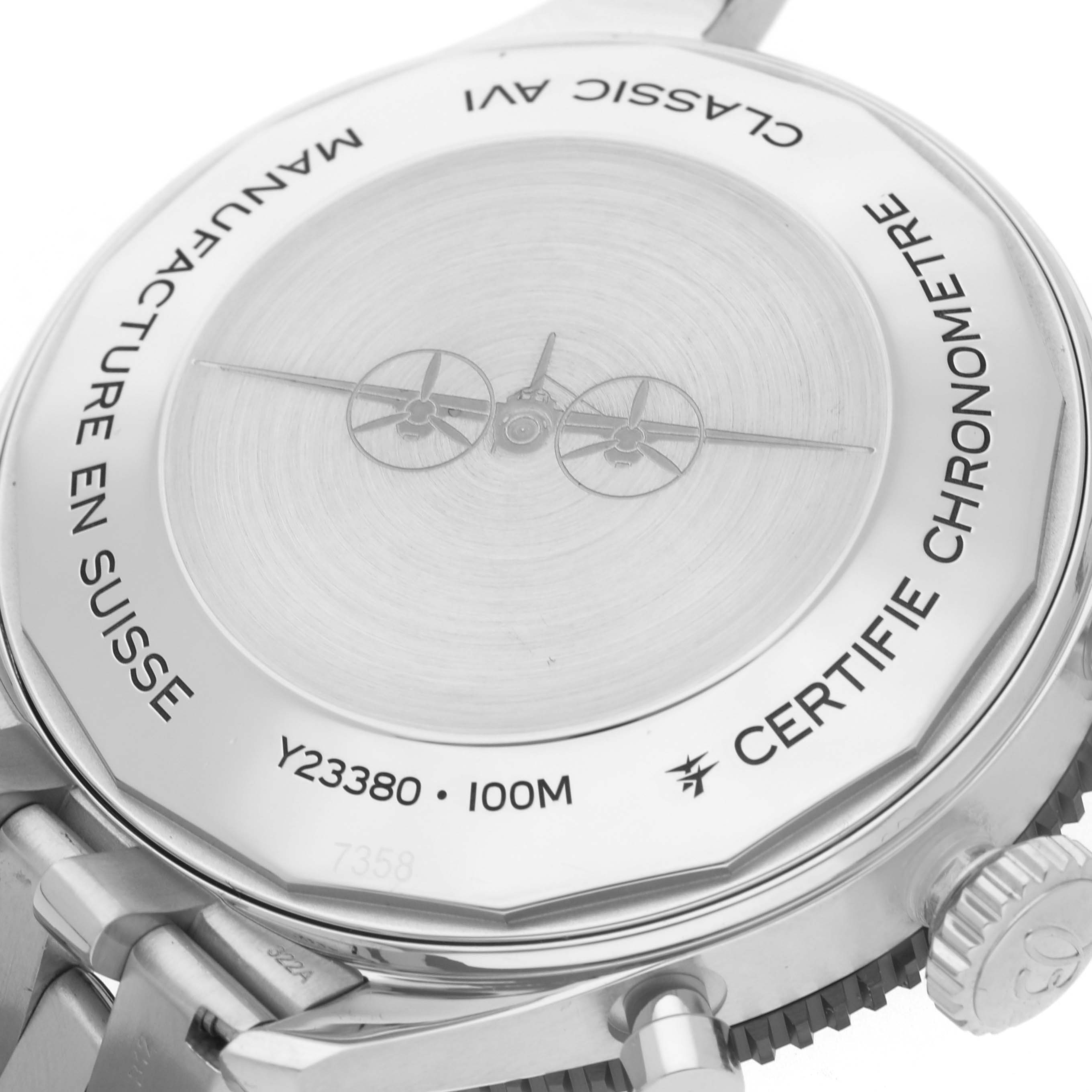 The image shows the back case of the Breitling Aviator Y233801A1B1A1 Men
s Stainless Steel Black Dial Y233801A1B1A1 Men
s Stainless Steel Black Dial watch at an angle, displaying its logo and water resistance details.