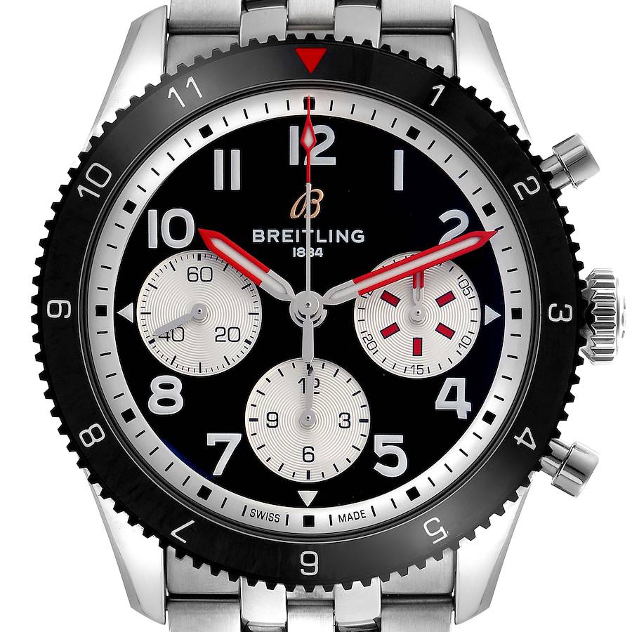 The Breitling Aviator watch is shown from a front angle with a focus on the dial and bezel.