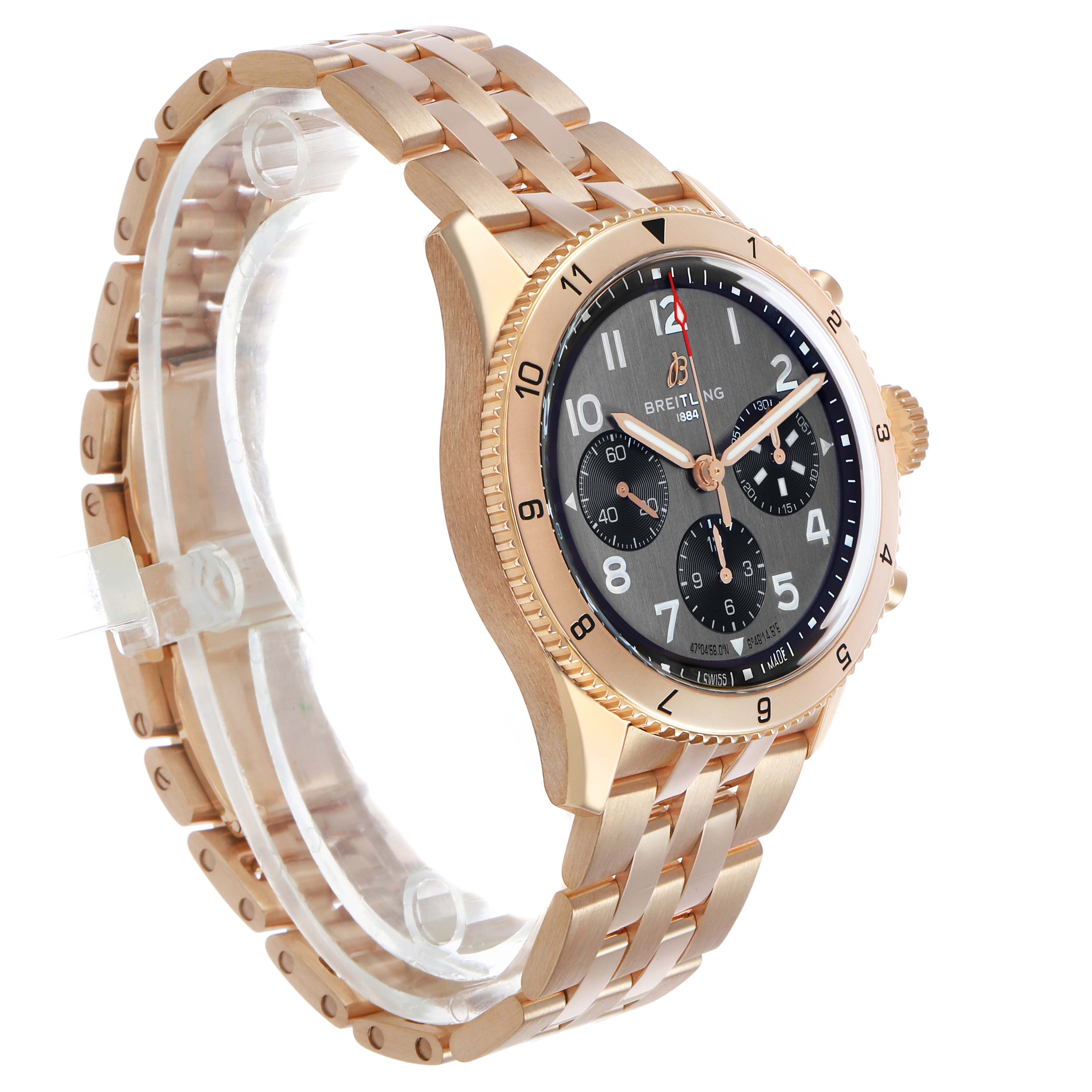 The Breitling Aviator R23380 Men's Rose Gold Grey Dial watch is shown at a three-quarter angle, highlighting the face, bezel, and bracelet.