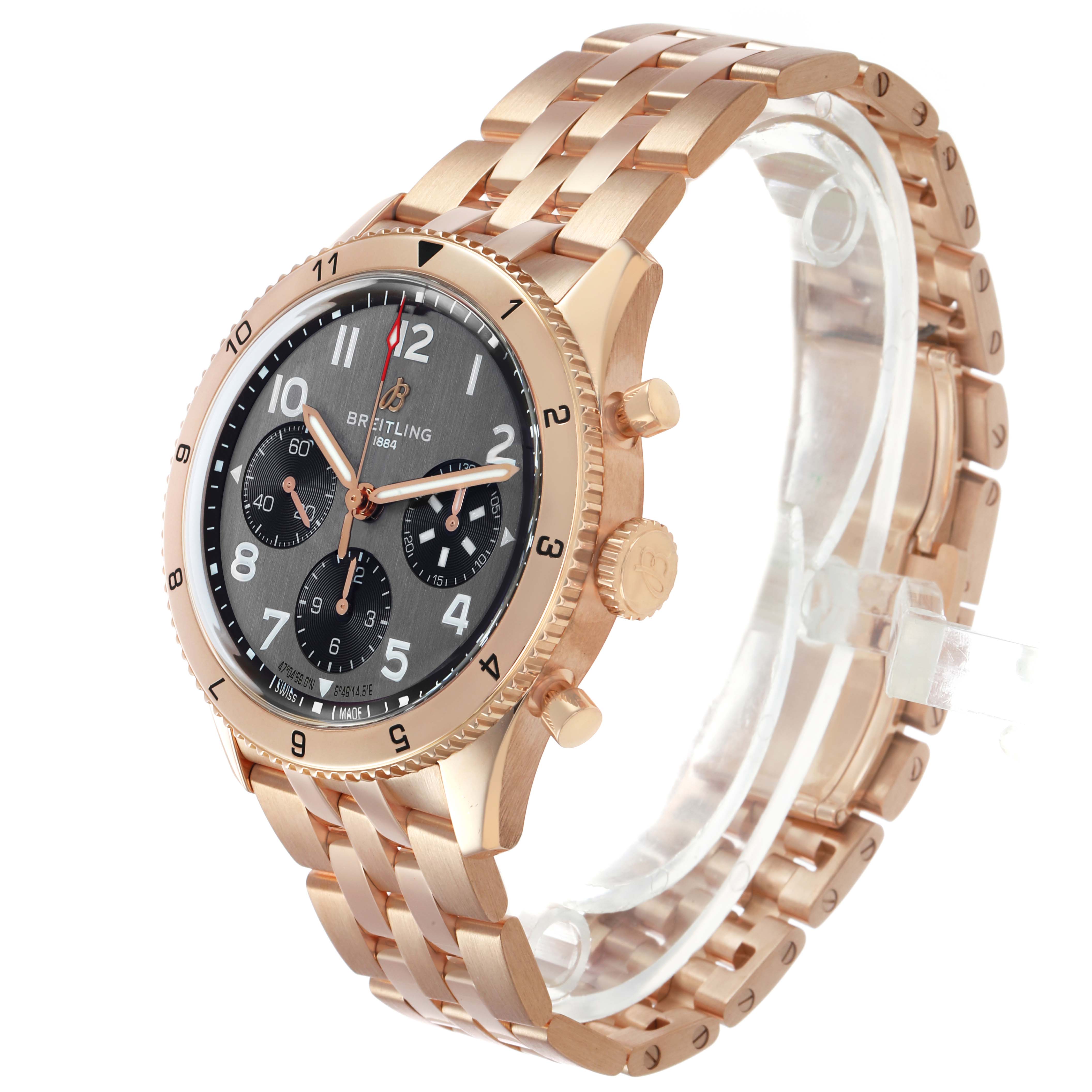 The Breitling Aviator R23380 Men's Rose Gold Grey Dial watch is shown at a slight angle, displaying its face, bracelet, and side buttons.