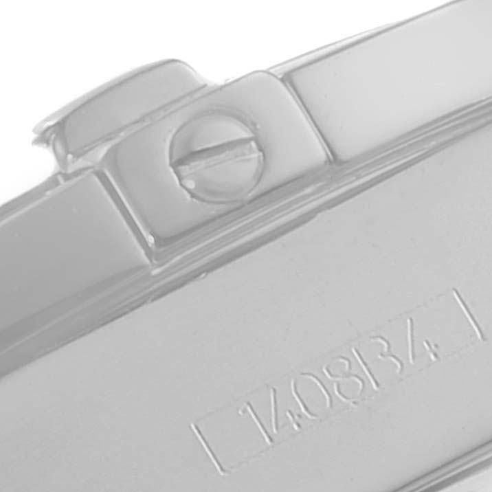 This is a close-up angle showing the side screws and serial number of the Breitling A17356 Women's Stainless Steel Burgundy Dial A17356 Women's Stainless Steel Burgundy Dial model A17356 Cockpit Chronometer.