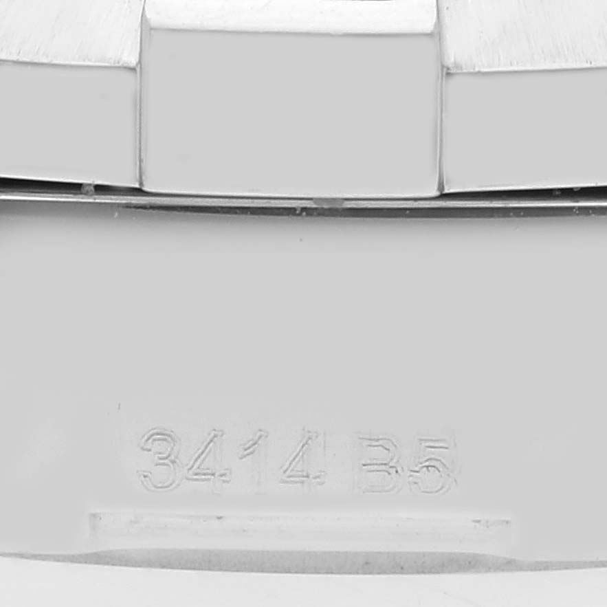 The image shows a close-up of the serial number engraving on the back of the Breitling Colt A17388 Men's Stainless Steel Black Dial A17388 Men's Stainless Steel Black Dial watch.