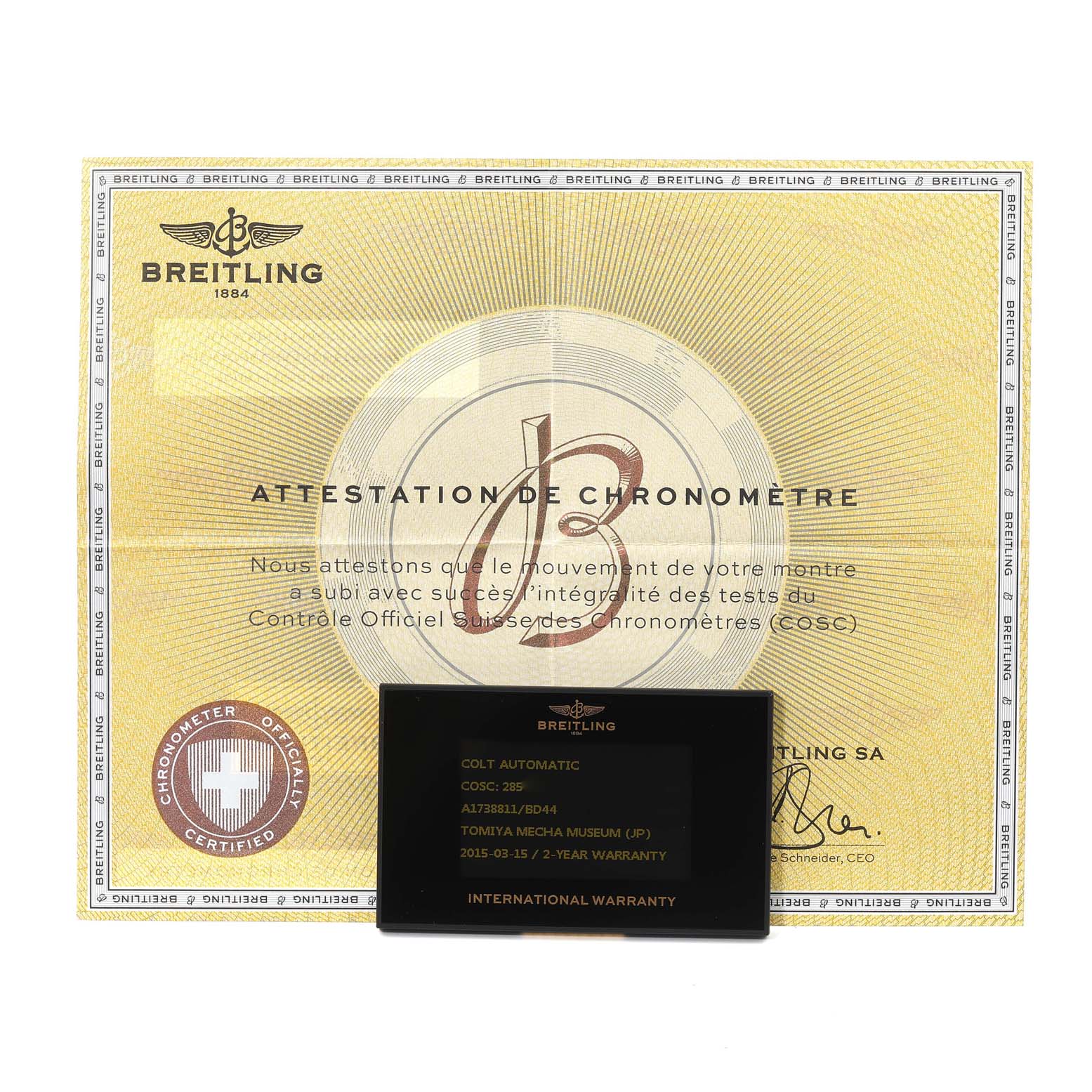 This image shows the warranty card and chronometer certification for the Colt model by Breitling.