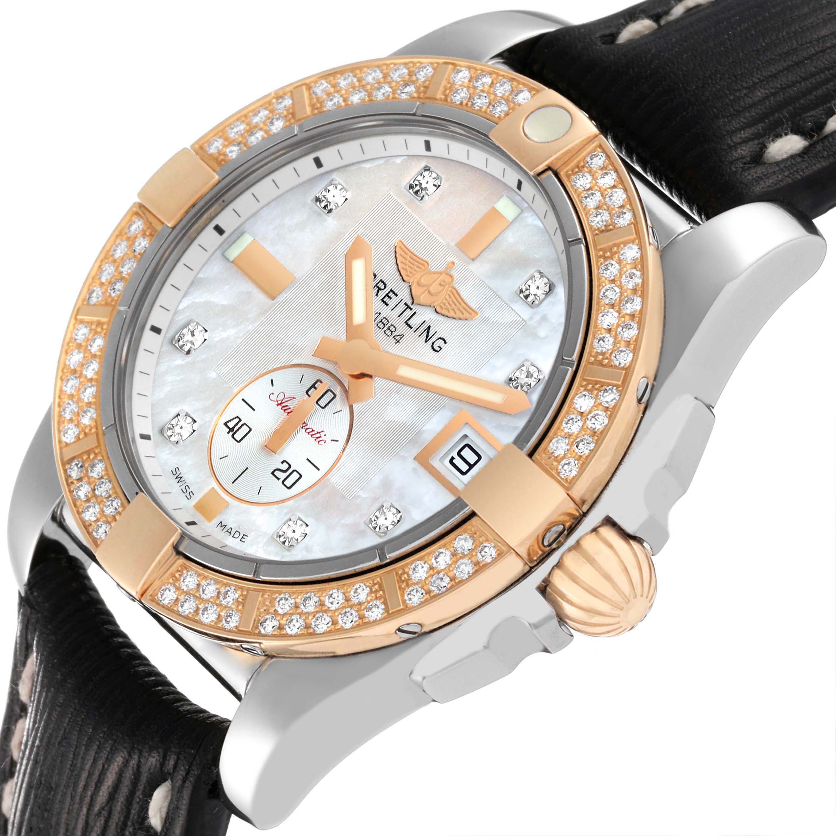The image shows a close-up angled view of the face and bezel of the Breitling Galactic C37330 Men's Steel and Gold (two tone) Mother of Pearl Dial C37330 Men's Steel and Gold (two tone) Mother of Pearl Dial watch, highlighting its design and details.