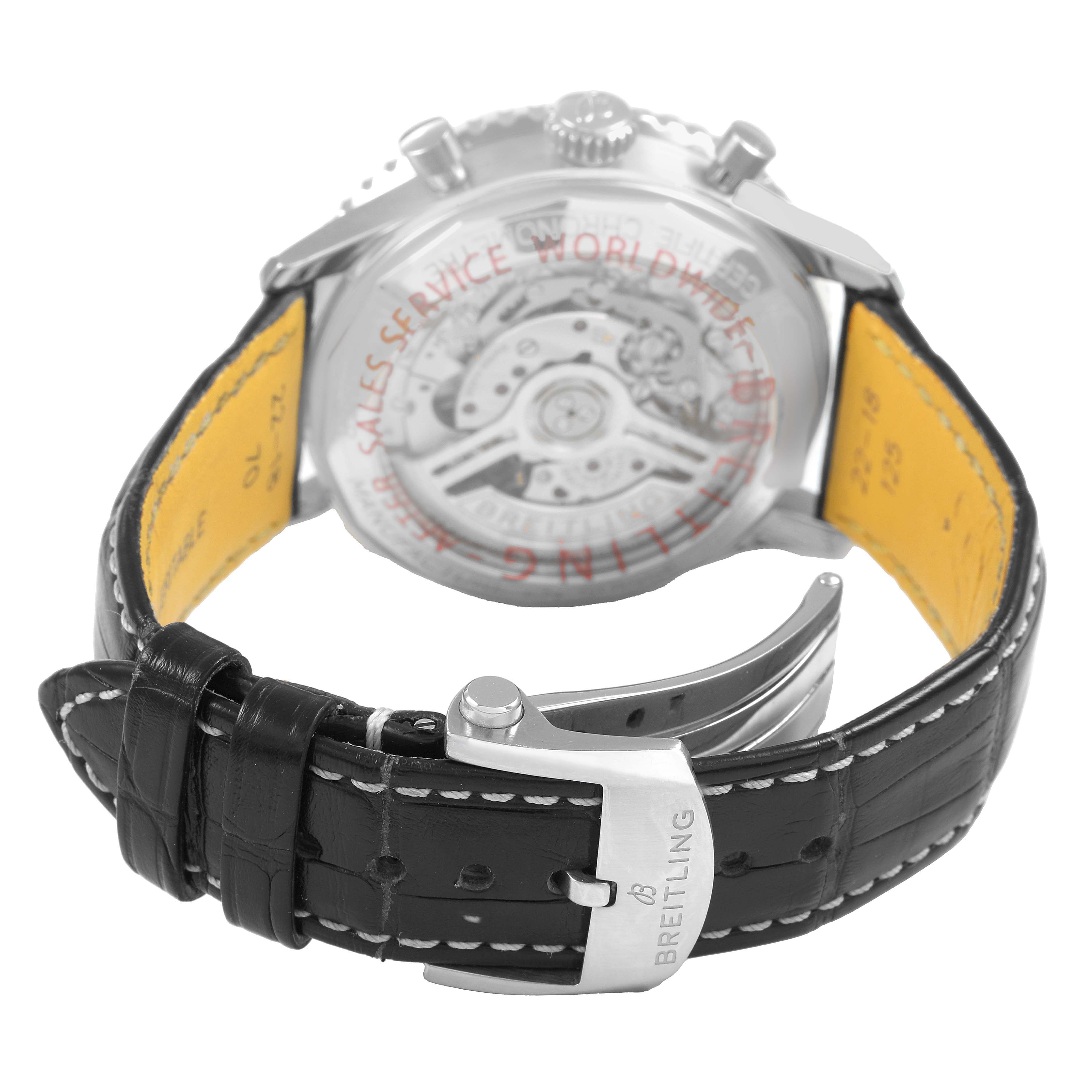 The image shows a Breitling Navitimer PB1920 Men's Stainless Steel Blue Dial watch from the back, highlighting the transparent case back and black leather strap with clasp.