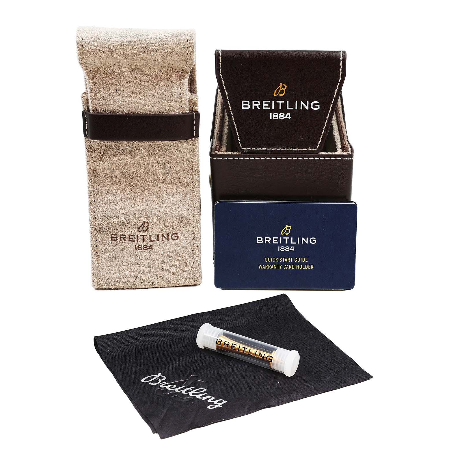 The image shows a Breitling Navitimer PB1920 Men's Stainless Steel Blue Dial watch case, quick start guide, cleaning cloth, and additional accessory tube.