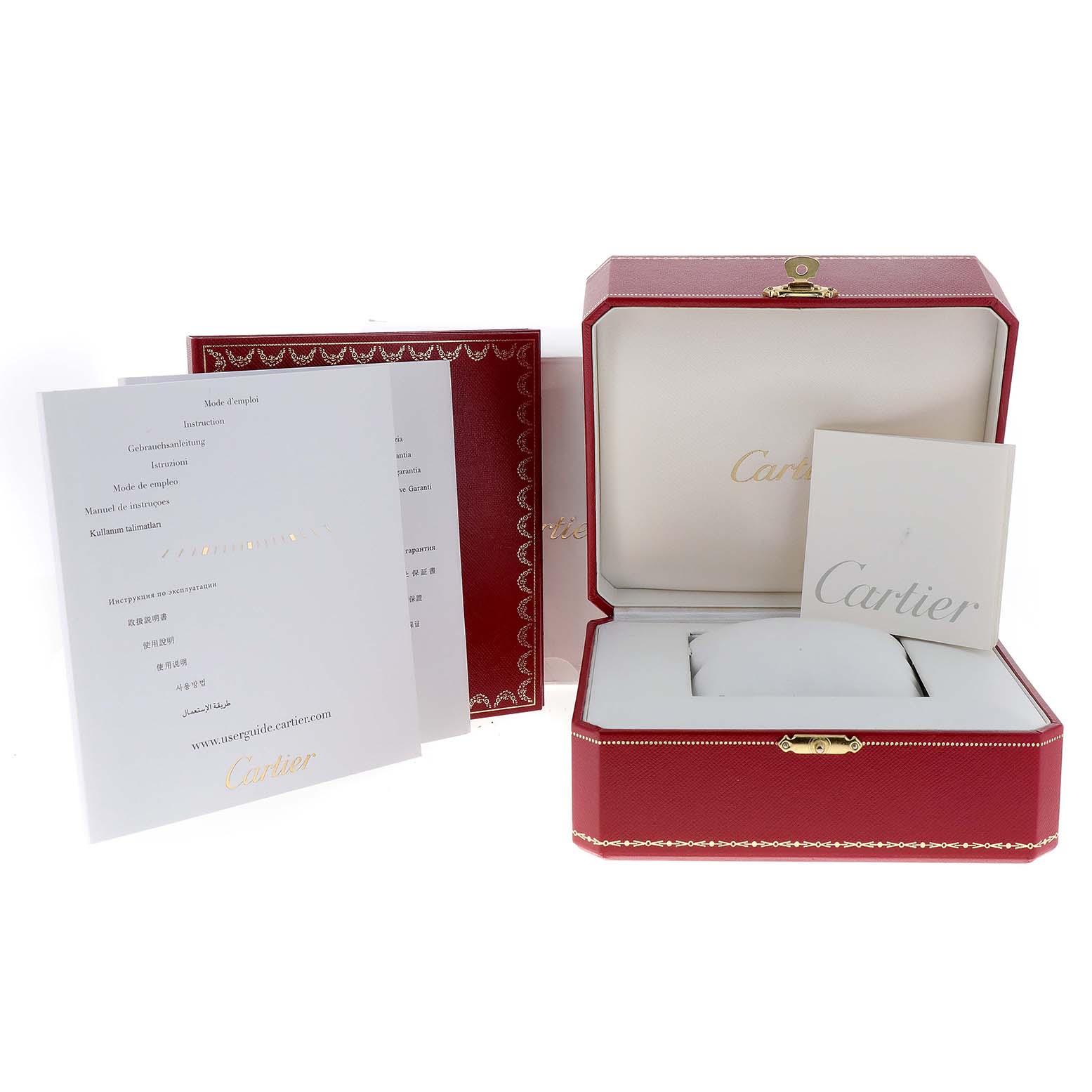 The image shows the packaging and documentation for a Ballon Bleu model by Cartier with an open red box and instruction manuals.