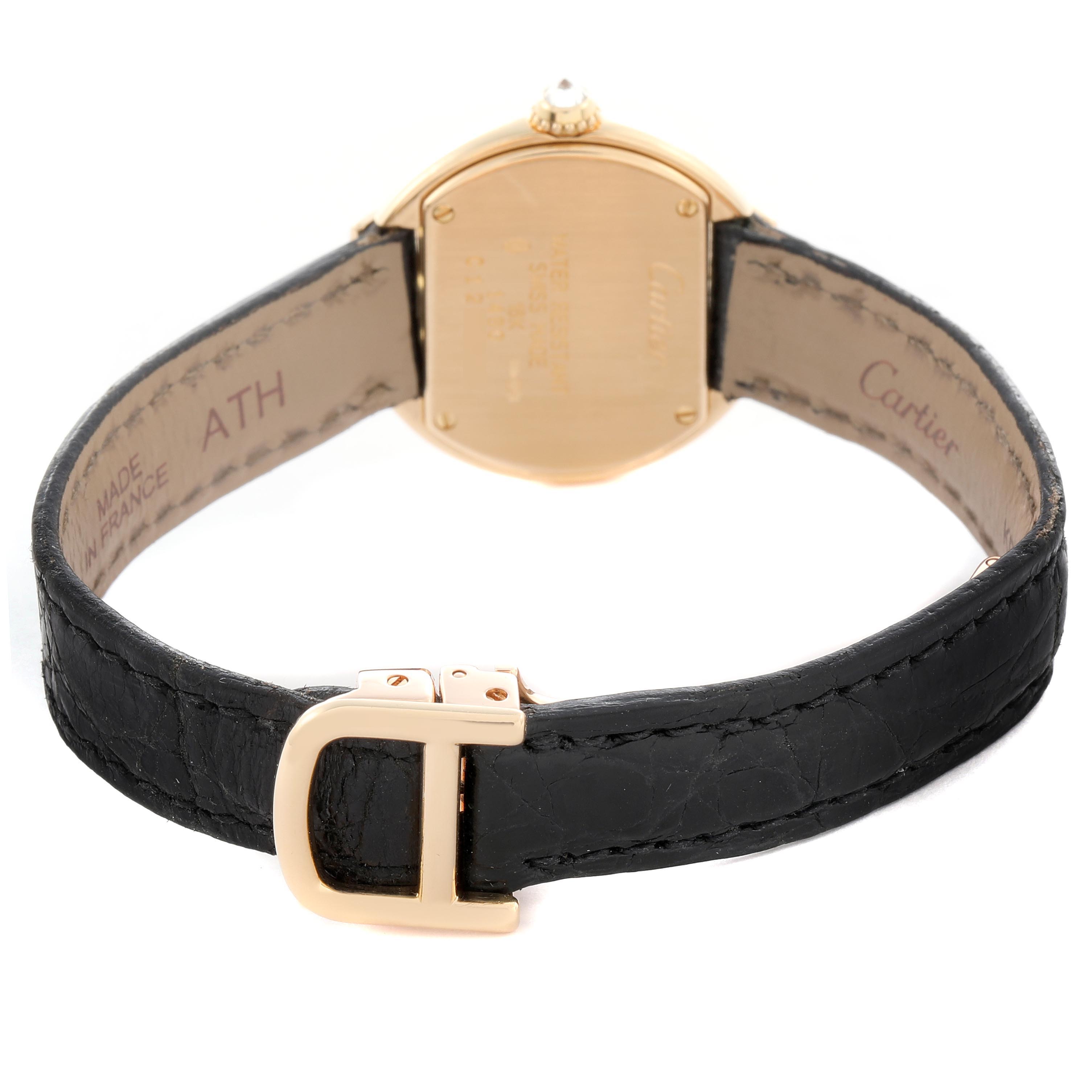 The image shows the back of a Cartier Tortue WB600851 Women
s Yellow Gold Silver Dial WB600851 Women
s Yellow Gold Silver Dial watch, highlighting the case back and strap with a focus on the buckle.