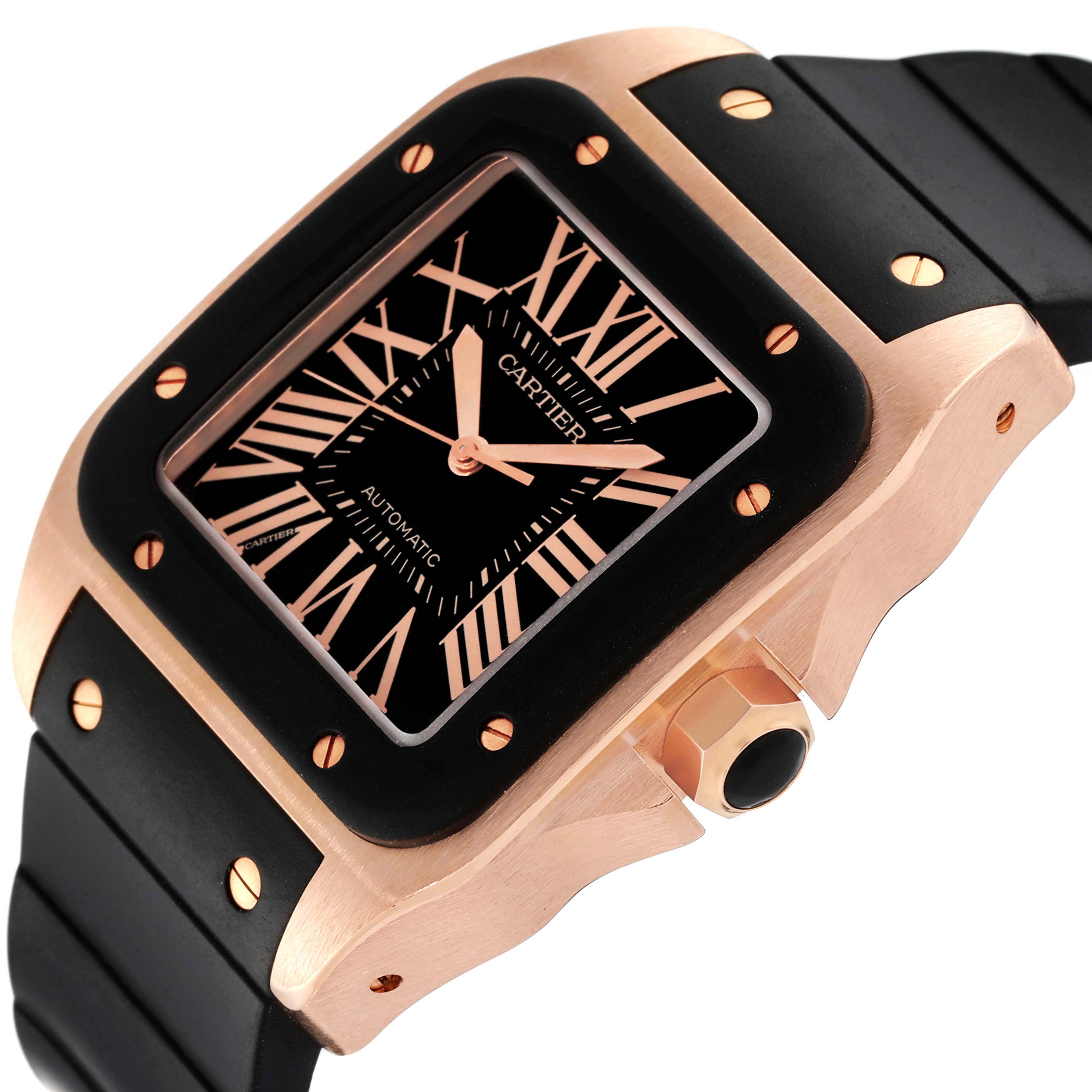 This image shows a Cartier Santos W20124U2 Men's Rose Gold Black Dial W20124U2 Men's Rose Gold Black Dial watch featuring its face, bezel, crown, and part of the black strap at an angled perspective.