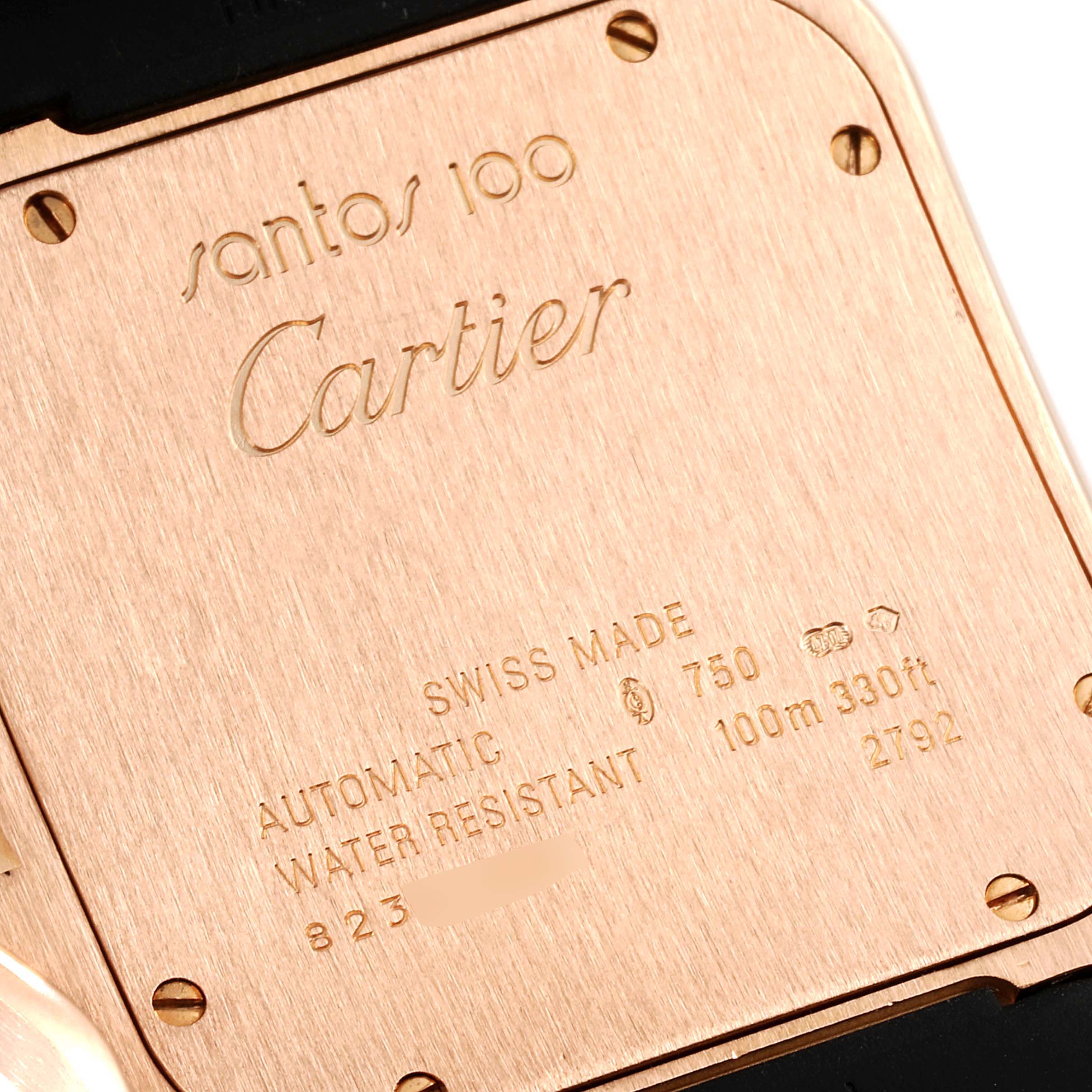 This image shows the back casing of a Cartier Santos W20124U2 Men's Rose Gold Black Dial W20124U2 Men's Rose Gold Black Dial 100 watch, highlighting model engravings and specifications.