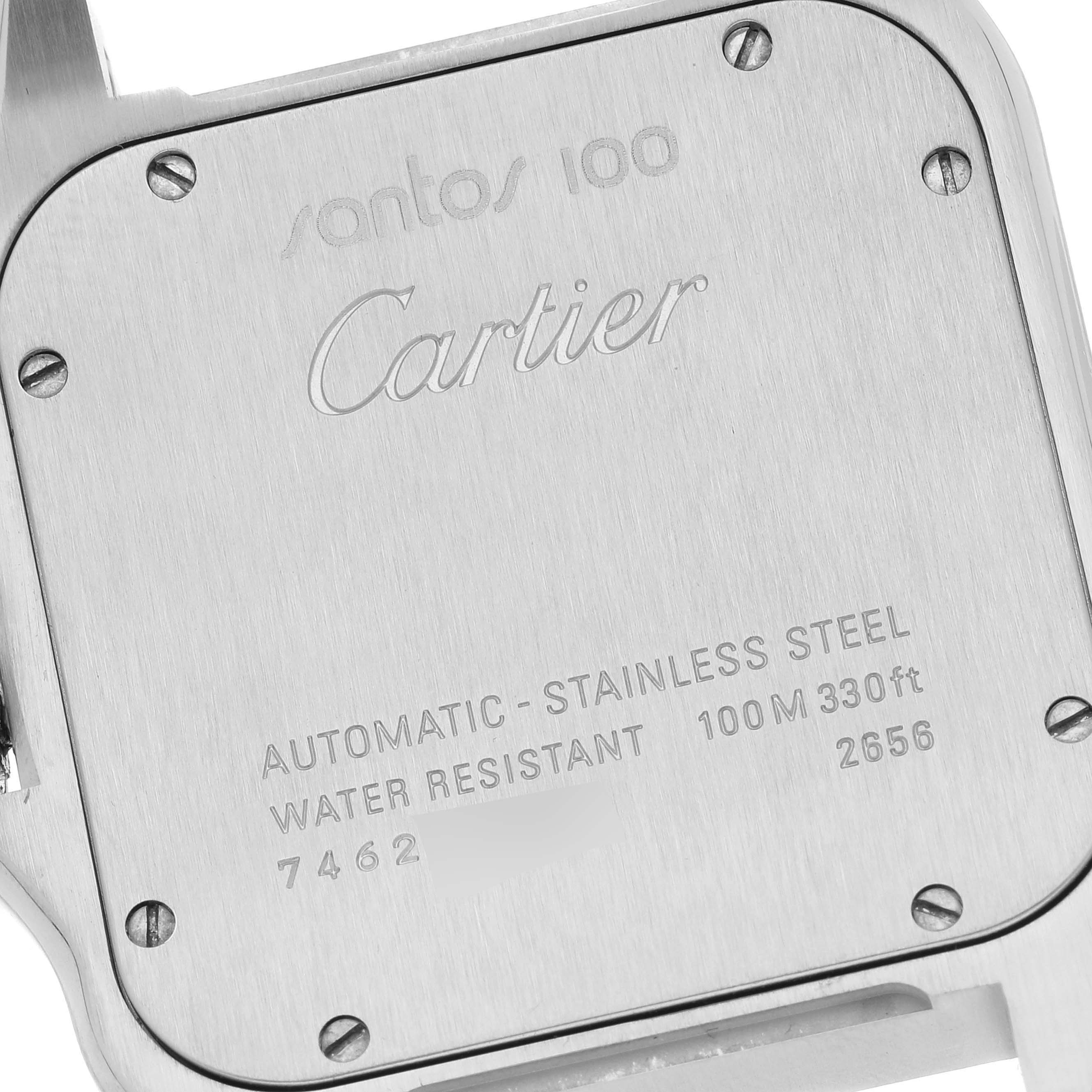 The image shows the case back of a Santos 100 watch by Cartier, highlighting its material and specifications.