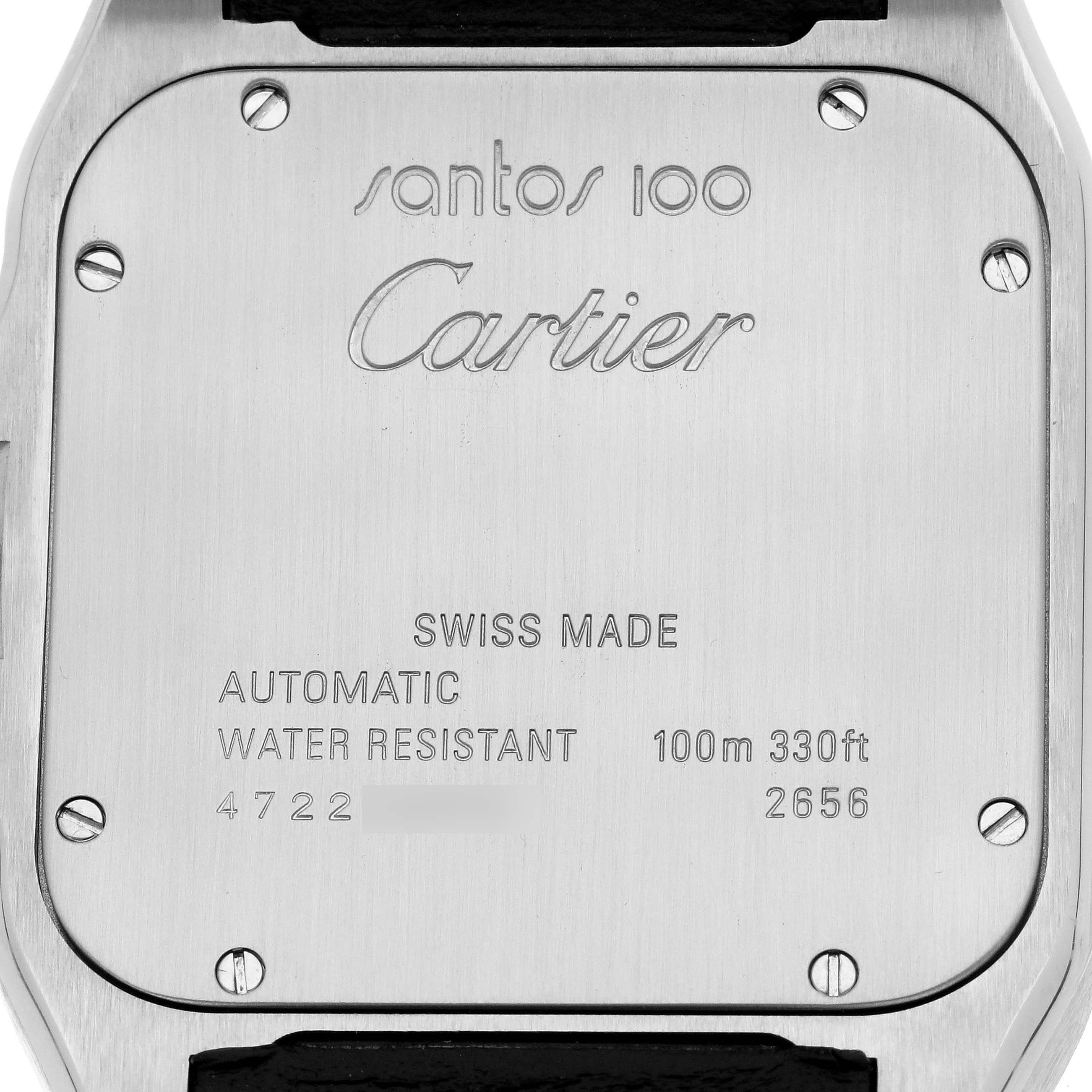 This is a close-up shot of the case back of the Cartier Santos W20072X7 Men's Steel and Gold (two tone) Silver Dial W20072X7 Men's Steel and Gold (two tone) Silver Dial 100 watch, showing engravings and screws.