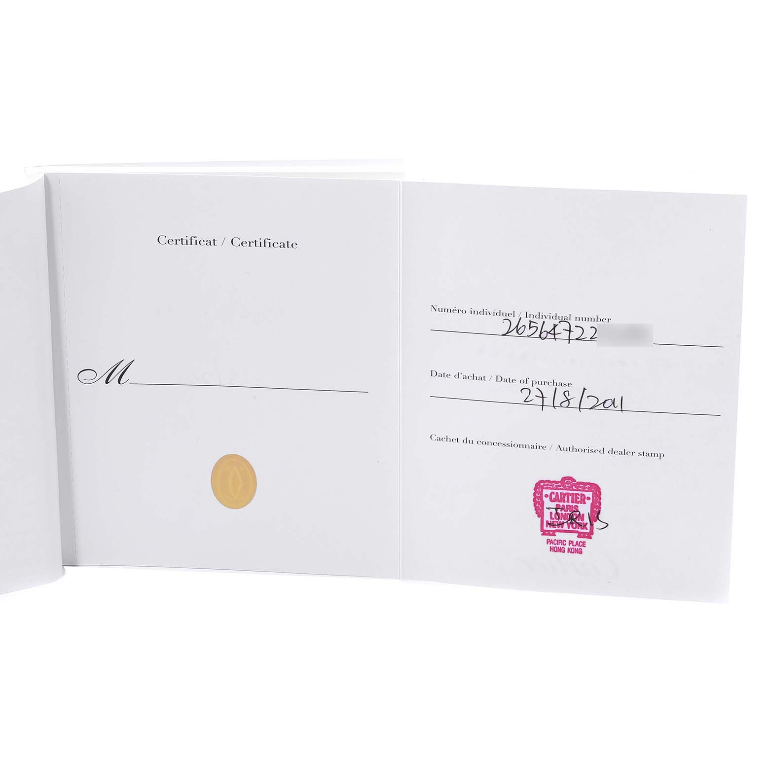 This image shows an open certificate booklet for the Santos model by Cartier, displaying purchase details and dealer stamp.