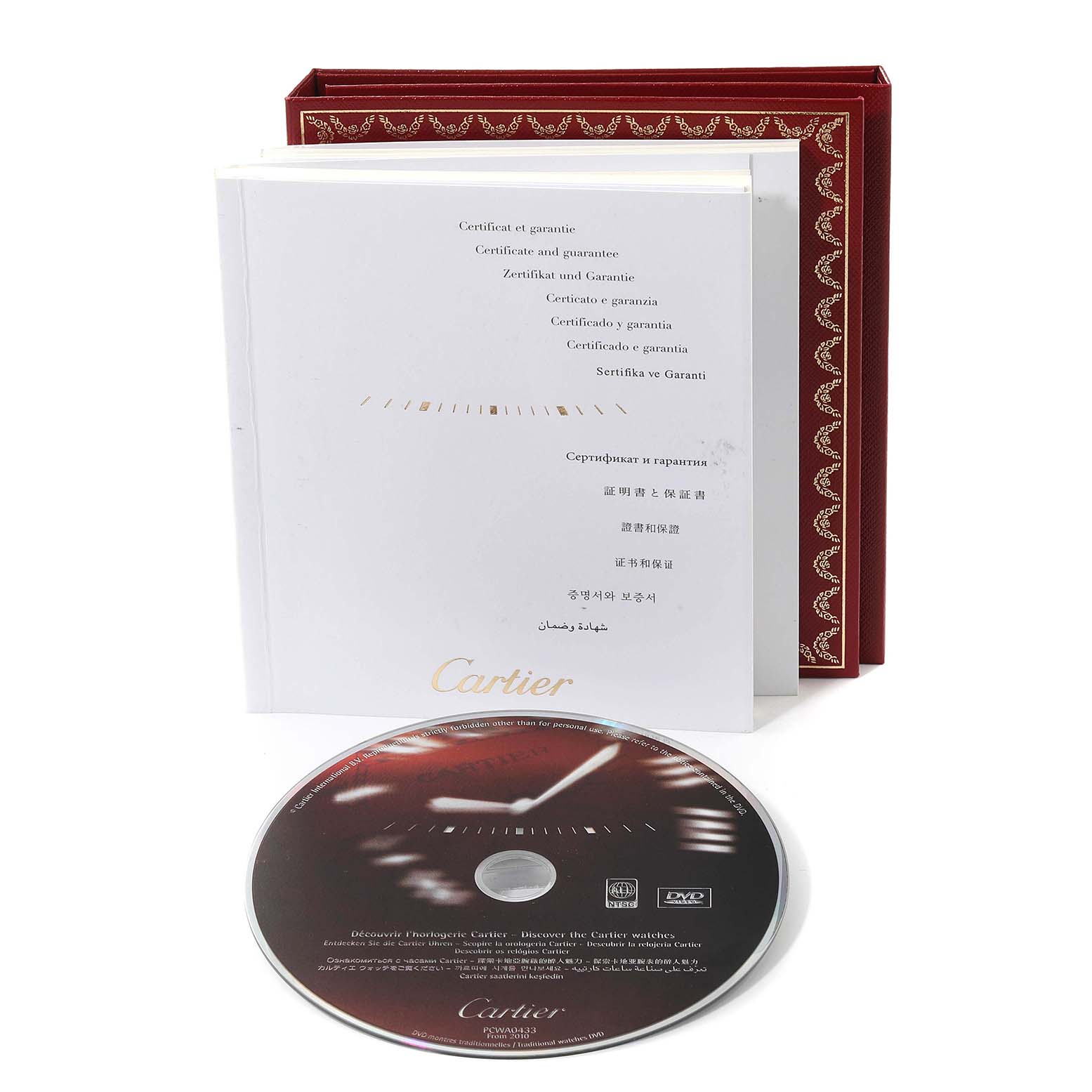 The image shows the warranty certificate, manual, and DVD for a Santos model by Cartier.