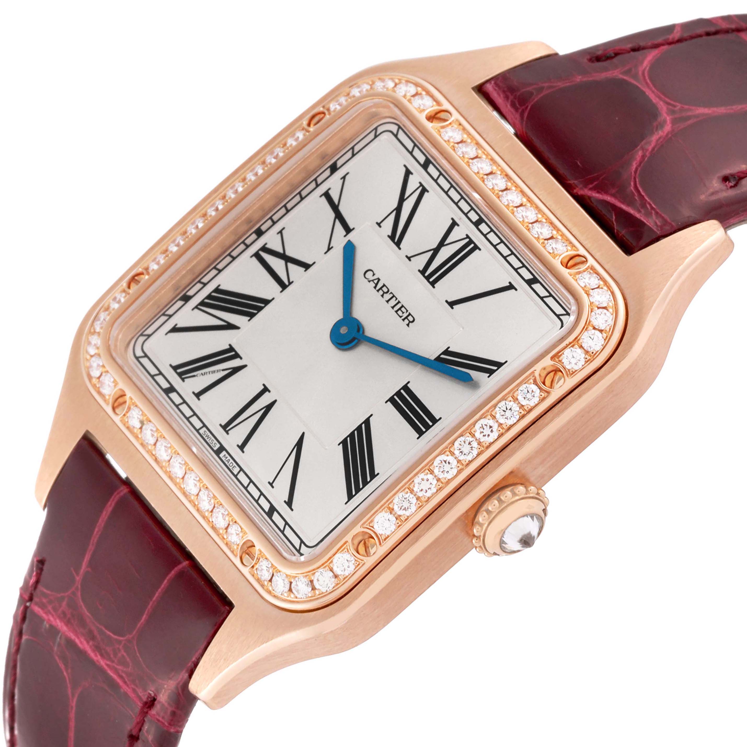 The Cartier Santos WJSA0016 Women's Rose Gold Silver Dial watch is shown at an angle highlighting its face, case, and part of the strap.