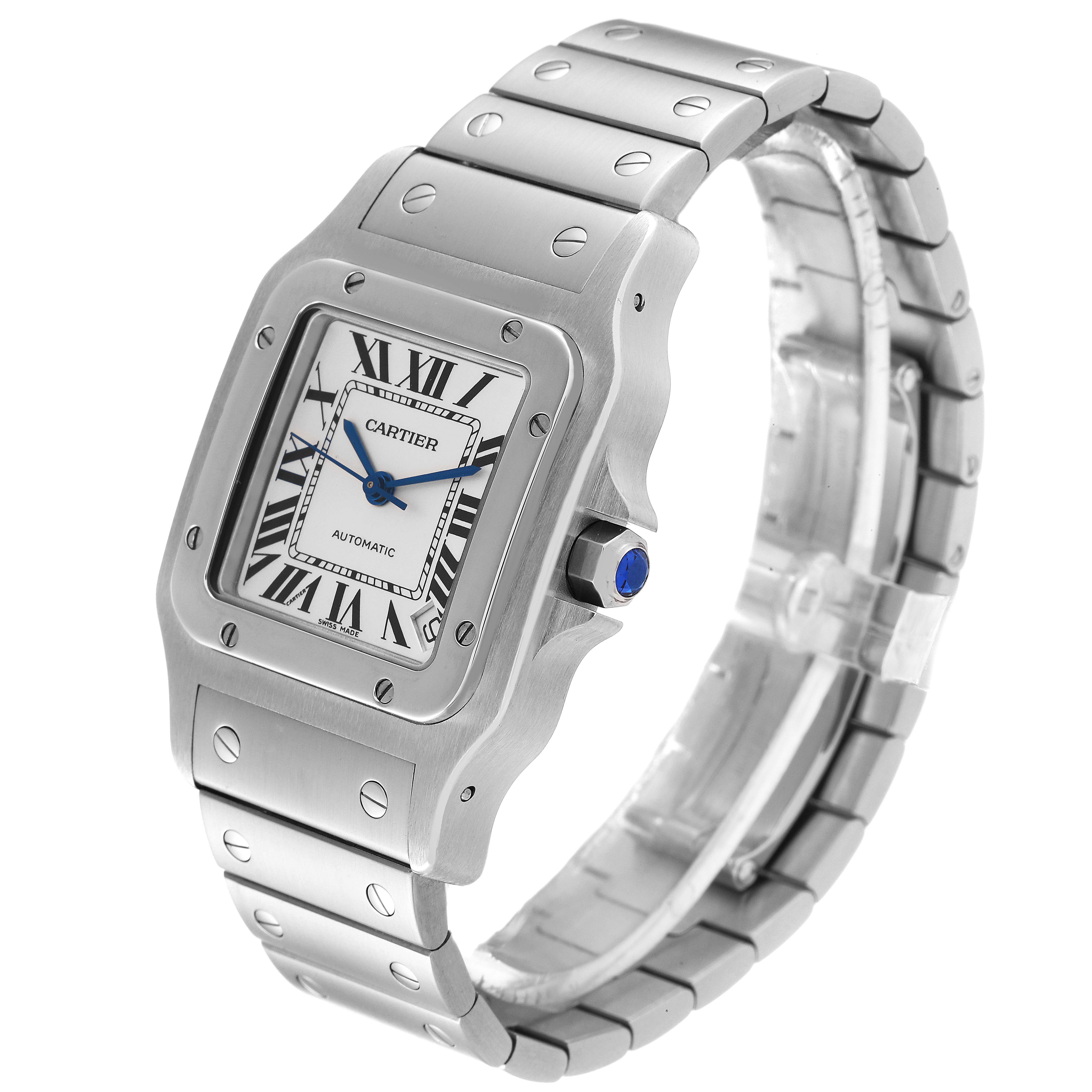 The image shows a Cartier Santos W20098D6 Men
s Stainless Steel Silver Dial W20098D6 Men
s Stainless Steel Silver Dial watch at a three-quarter angle, highlighting the face, bracelet, and crown with a blue jewel.