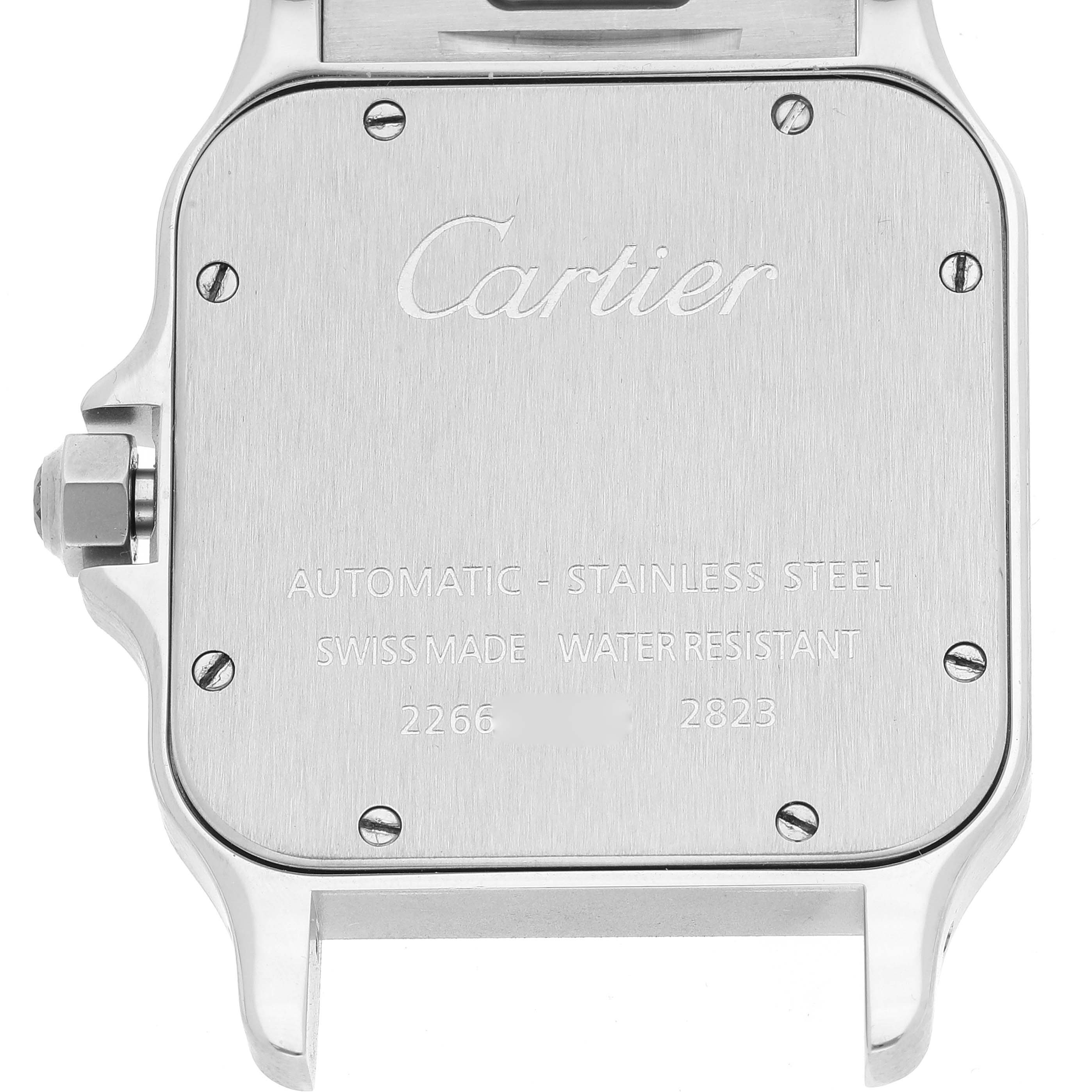 This image shows the back case of a Cartier Santos W20098D6 Men
s Stainless Steel Silver Dial W20098D6 Men
s Stainless Steel Silver Dial watch, displaying its engravings and screws.