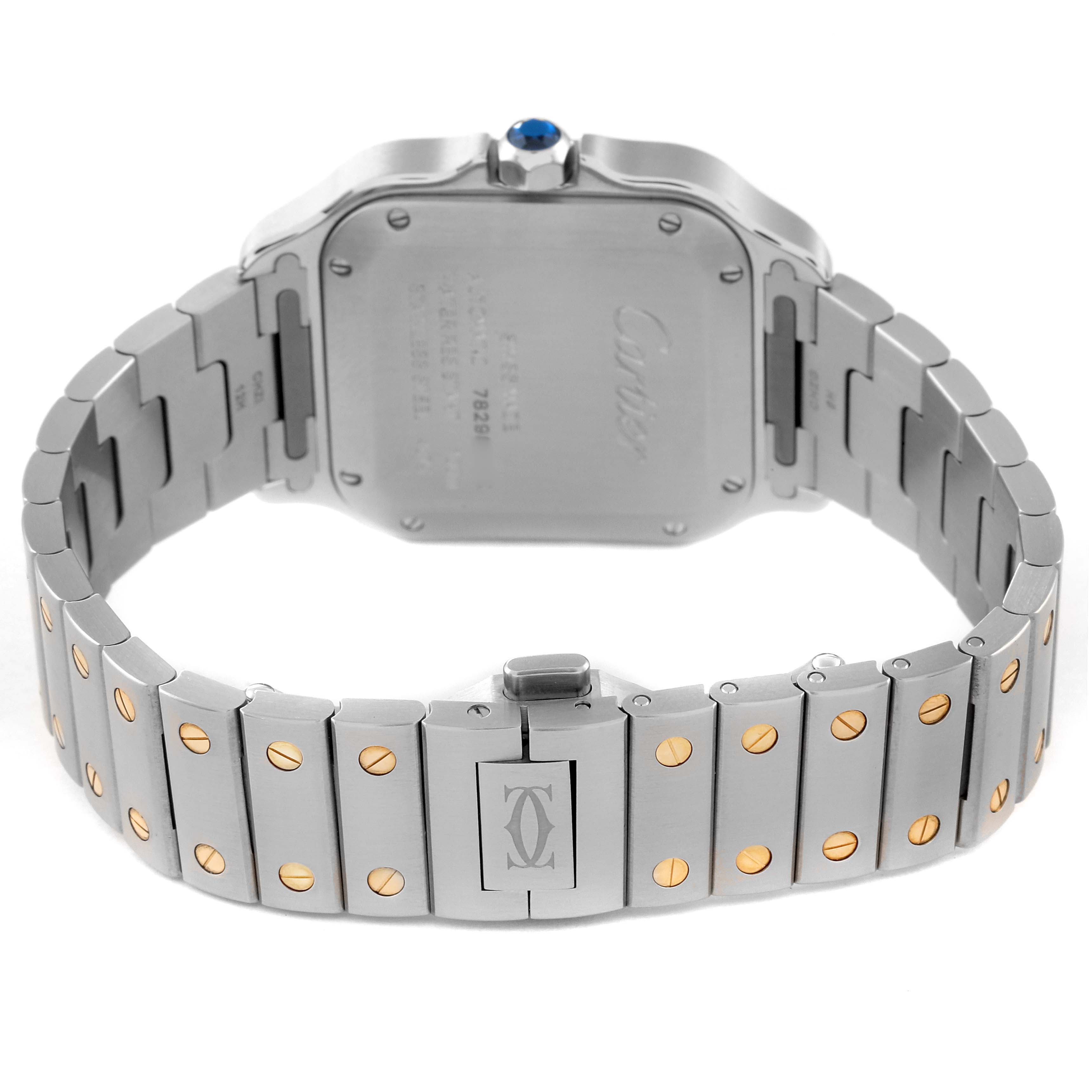 This image shows the back case and bracelet of a Cartier Santos W2SA0016 Men
s Steel and Gold (two tone) Silver Dial W2SA0016 Men
s Steel and Gold (two tone) Silver Dial watch, highlighting the blue crown and two-tone screw details.