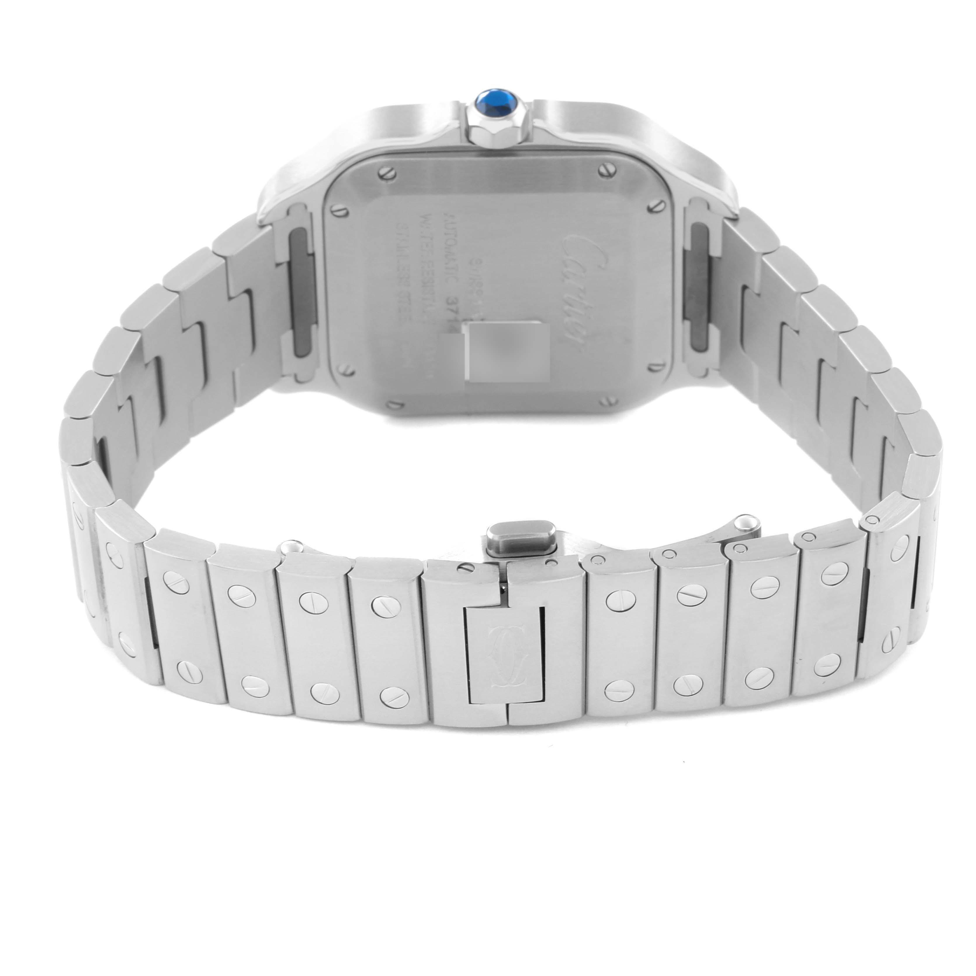 The image displays the back case and bracelet of the Santos model by Cartier from a rear angle.