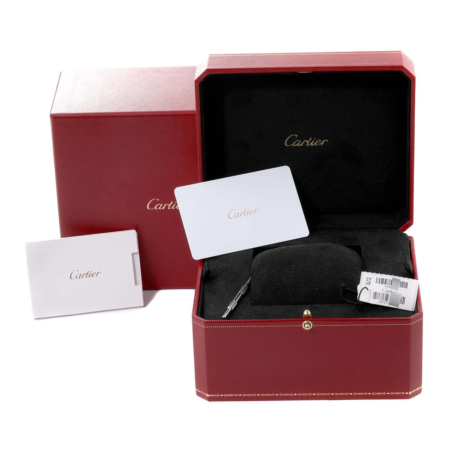 The image shows the box, pillow, tag, and cards for the Cartier Santos WSSA0029 Men
s Stainless Steel Silver Dial WSSA0029 Men
s Stainless Steel Silver Dial model watch at an angle with the box lid open.