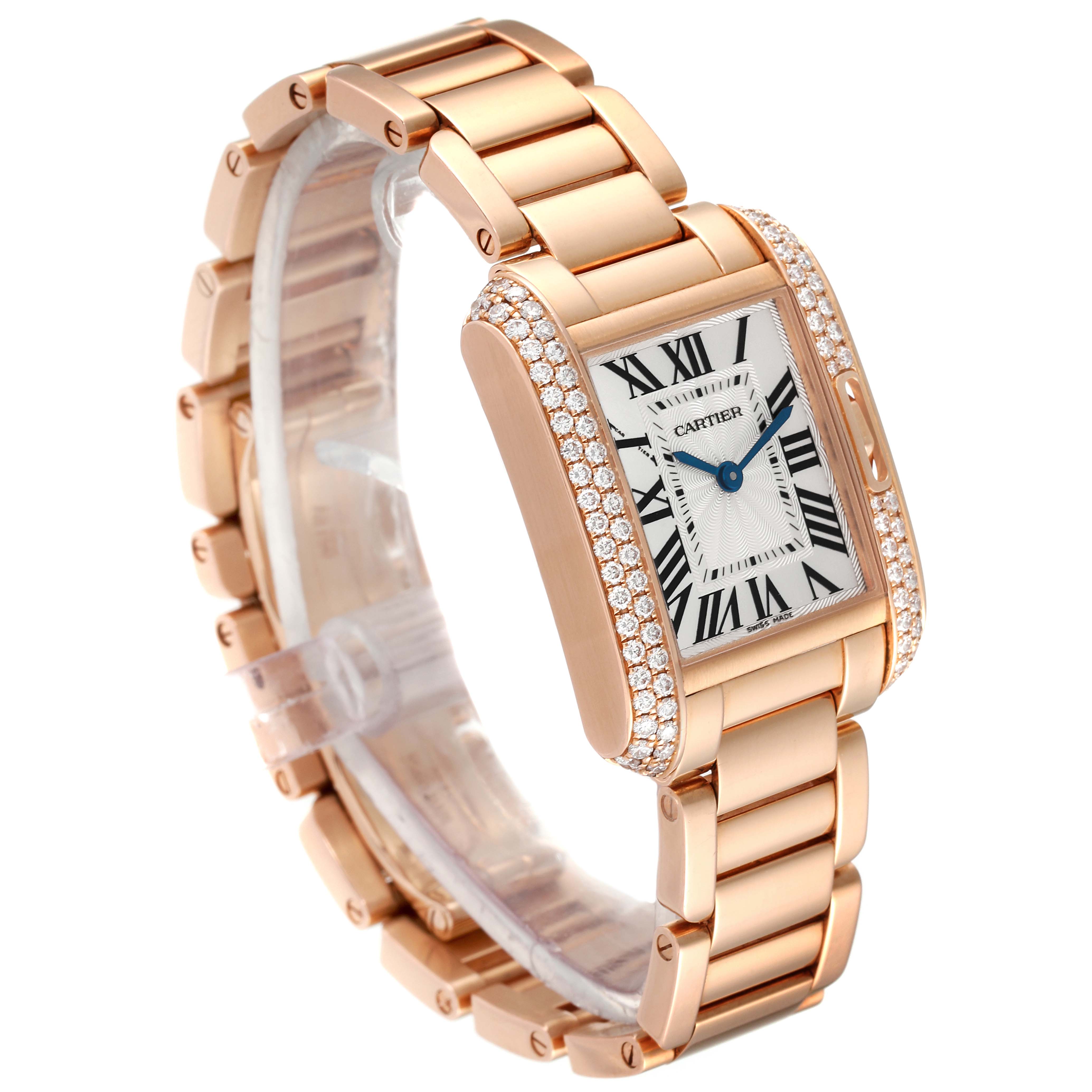 The image shows a side angle of the Cartier Tank Anglaise WT100002 Women
s Rose Gold Silver Dial WT100002 Women
s Rose Gold Silver Dial watch, highlighting its diamond-studded bezel and metal bracelet.