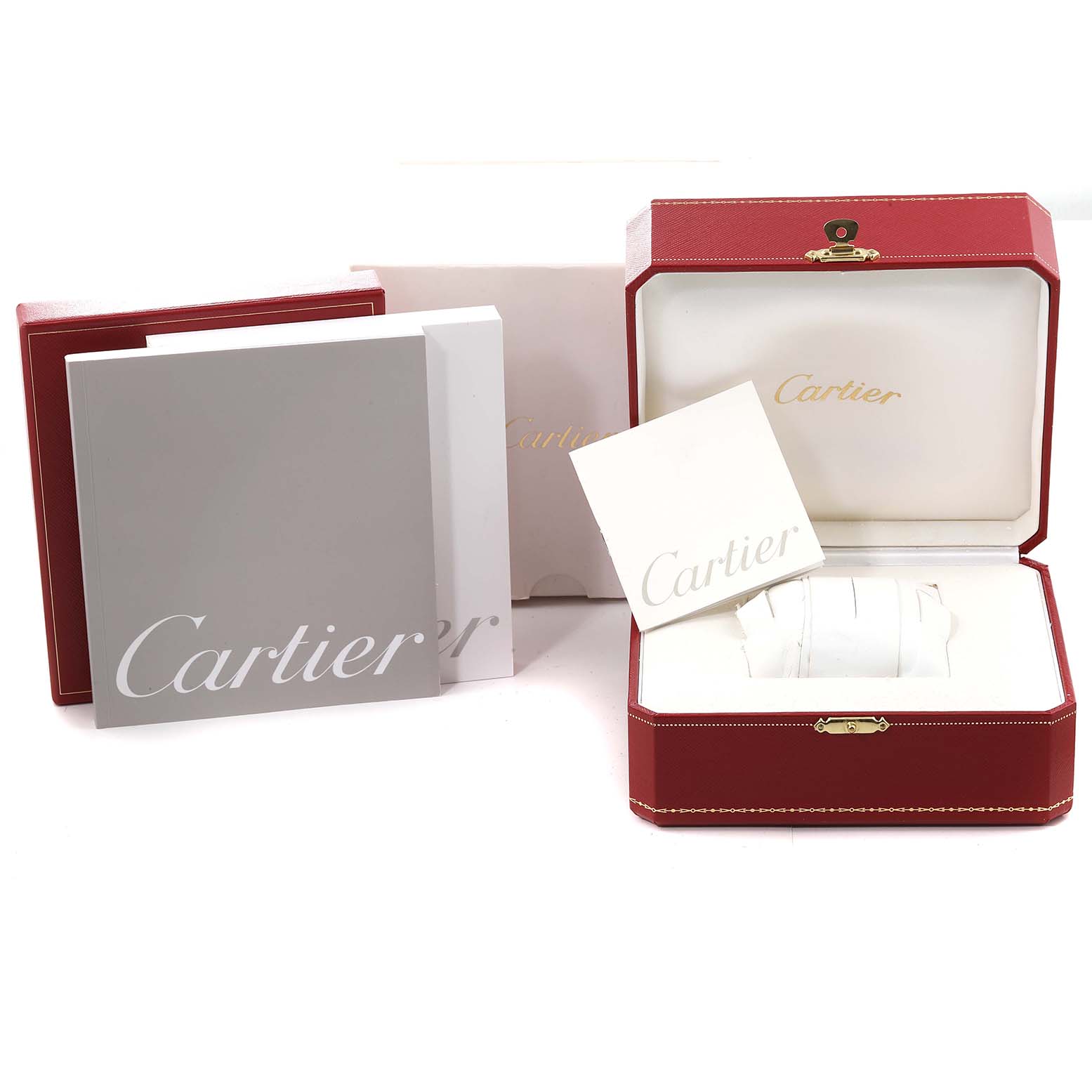 The image shows the packaging and accessories for a Cartier Tank Francaise W51011Q3 Women's Stainless Steel Silver Dial W51011Q3 Women's Stainless Steel Silver Dial watch, including boxes, a display case, and manuals.