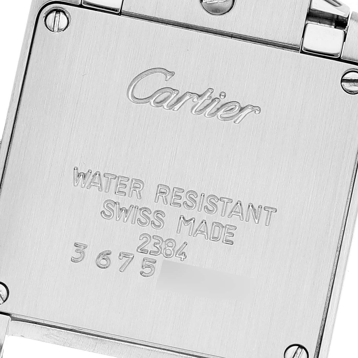 This is the back view of a Cartier Tank Francaise W51007Q4 Women's Steel and Gold (two tone) Silver Dial W51007Q4 Women's Steel and Gold (two tone) Silver Dial watch, displaying the brand name, model number, and manufacturing details.