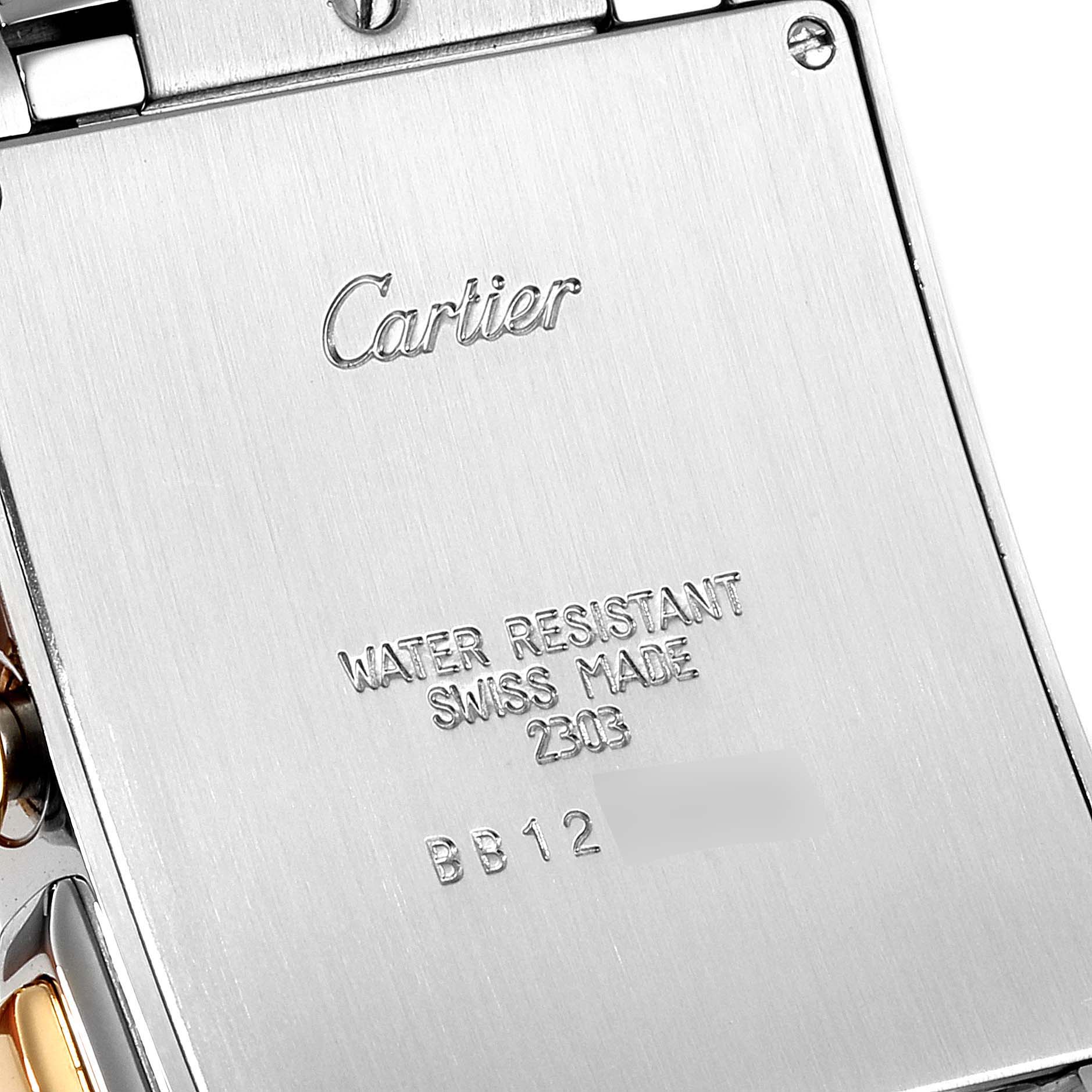This image shows the back case of a Cartier Tank Française watch, including the brand engraving and specifications.
