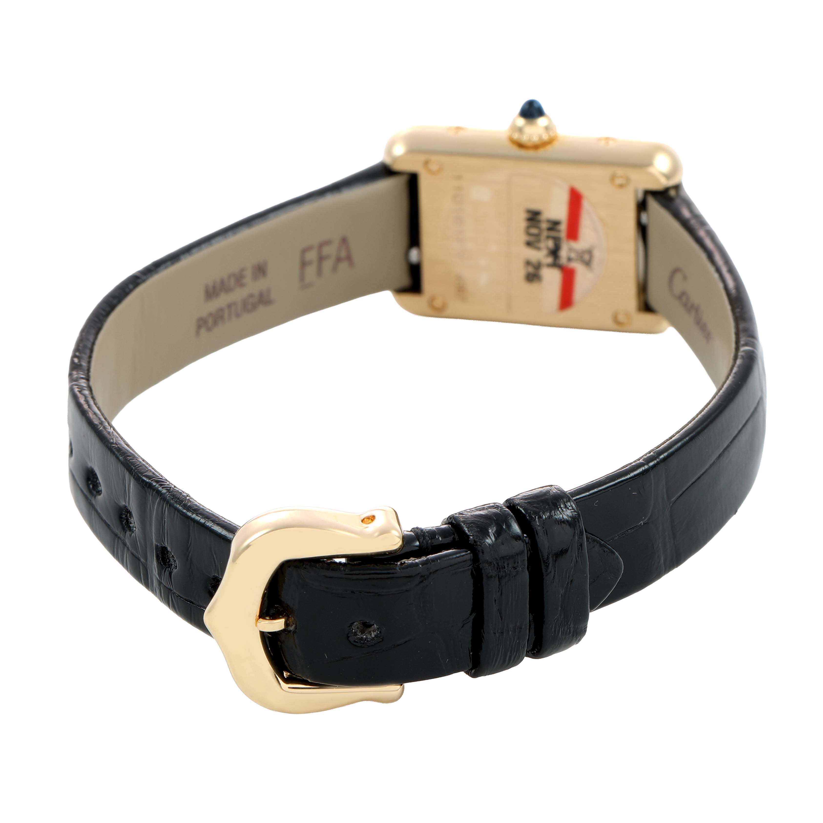 The image shows the back angle of a Cartier Tank Louis Women's Yellow Gold Silver Dial watch, displaying the strap, buckle, and case back.
