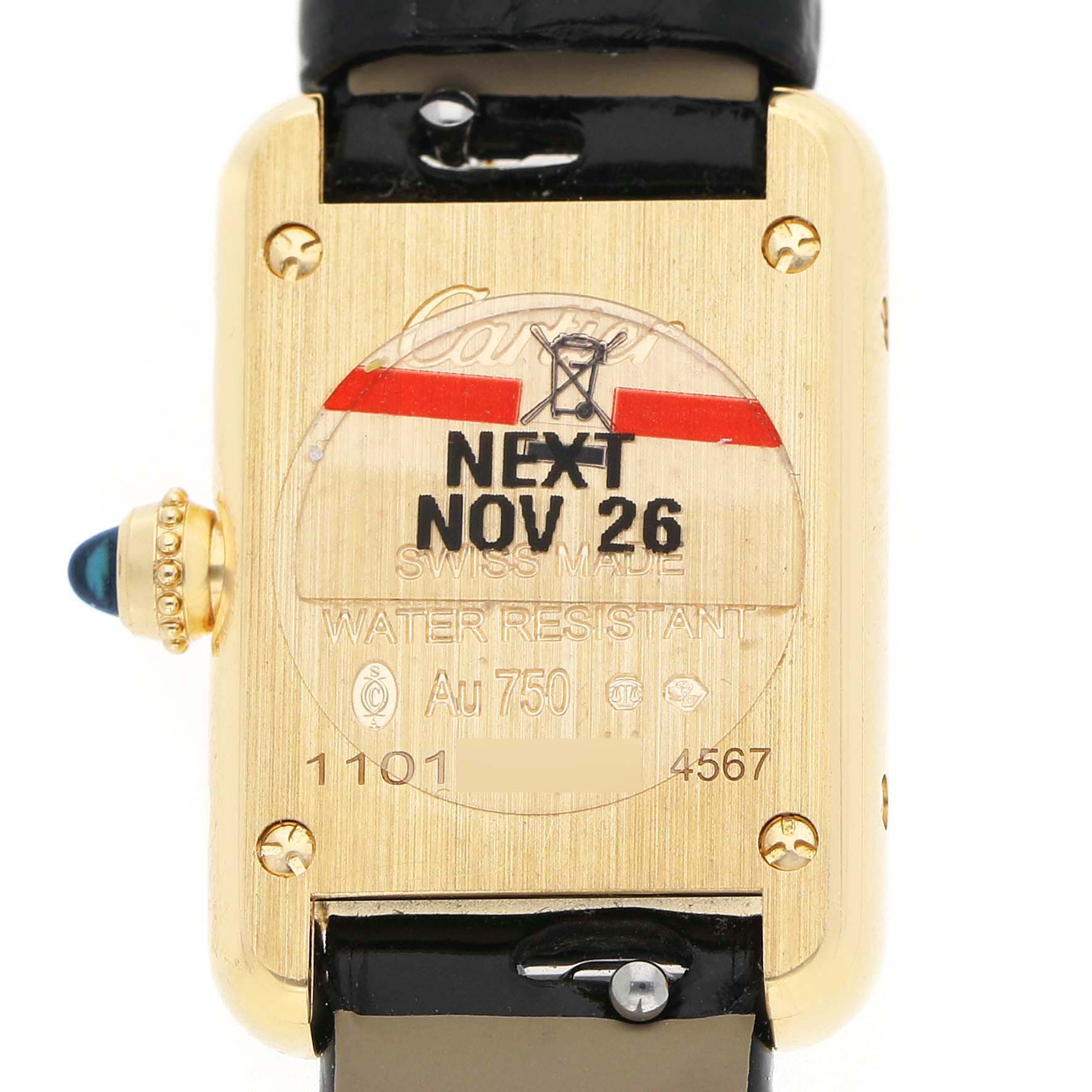 The image shows the back of a Cartier Tank Louis Women's Yellow Gold Silver Dial watch, highlighting the case back, crown, and strap attachment.