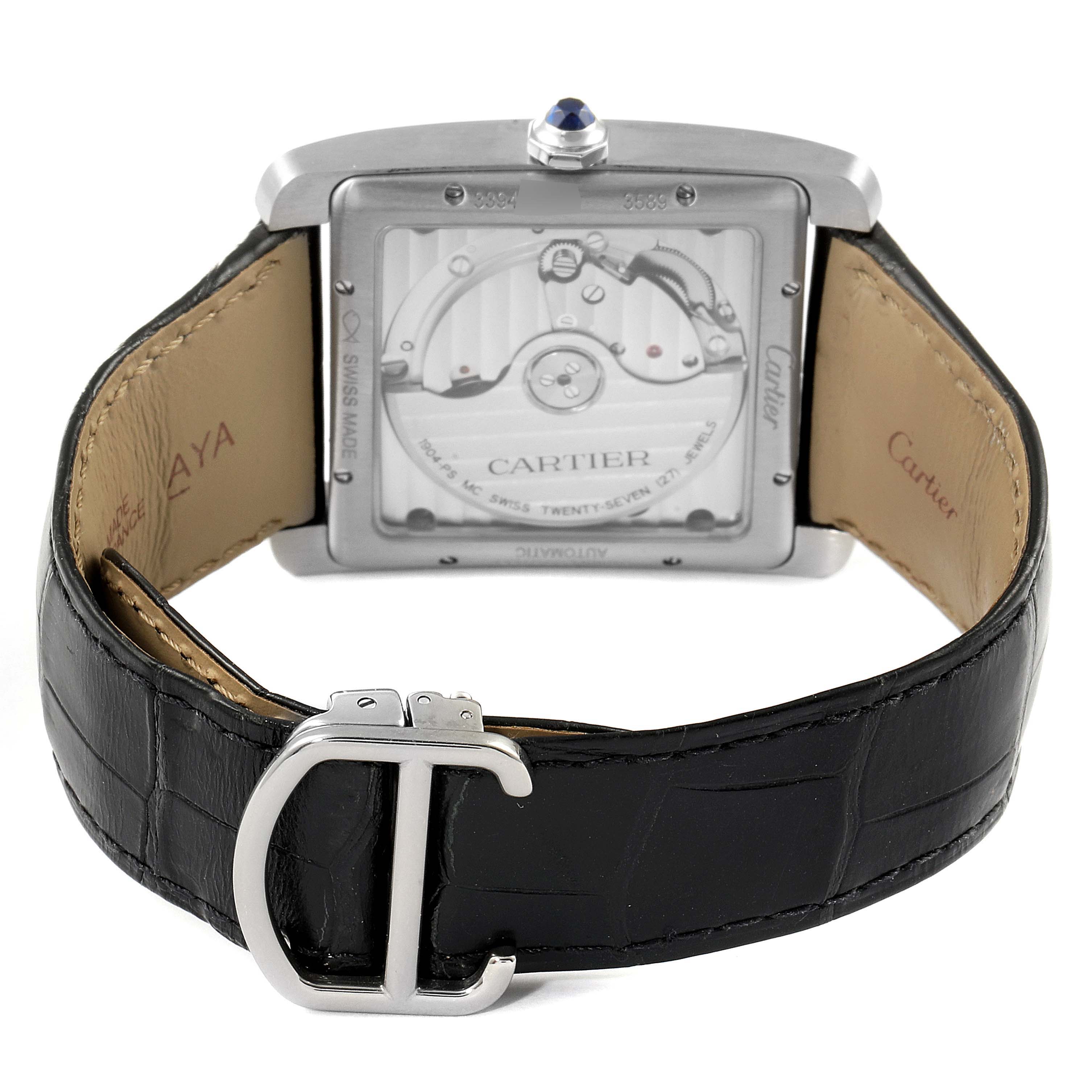 The image shows the back view of the Cartier Tank MC WSTA0010 Men's Stainless Steel Blue Dial WSTA0010 Men's Stainless Steel Blue Dial watch, highlighting its engraved case back and black leather strap with a buckle.