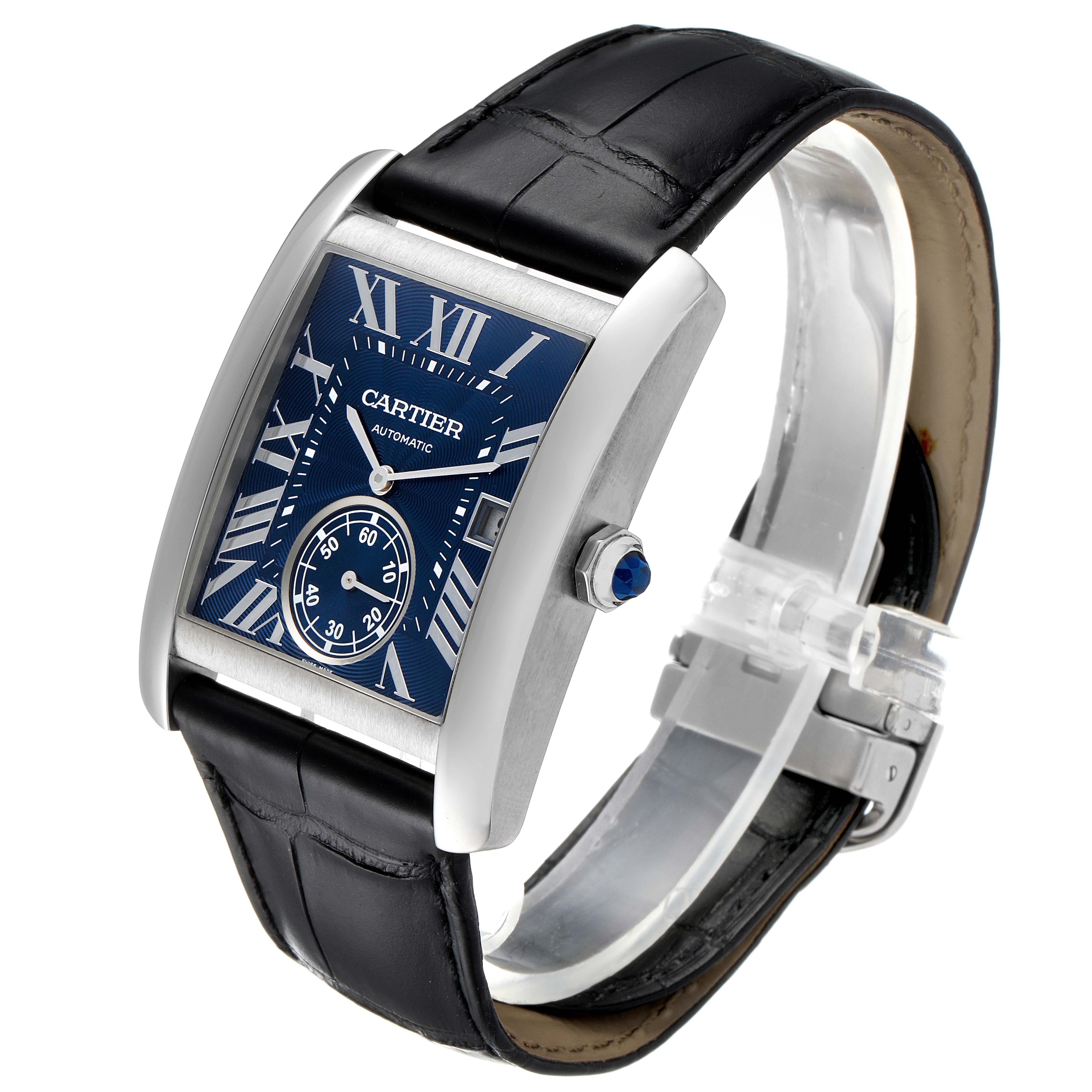 The Cartier Tank MC WSTA0010 Men's Stainless Steel Blue Dial WSTA0010 Men's Stainless Steel Blue Dial watch is shown at a slight angle, displaying the blue dial, Roman numerals, leather strap, and crown with a blue gem.