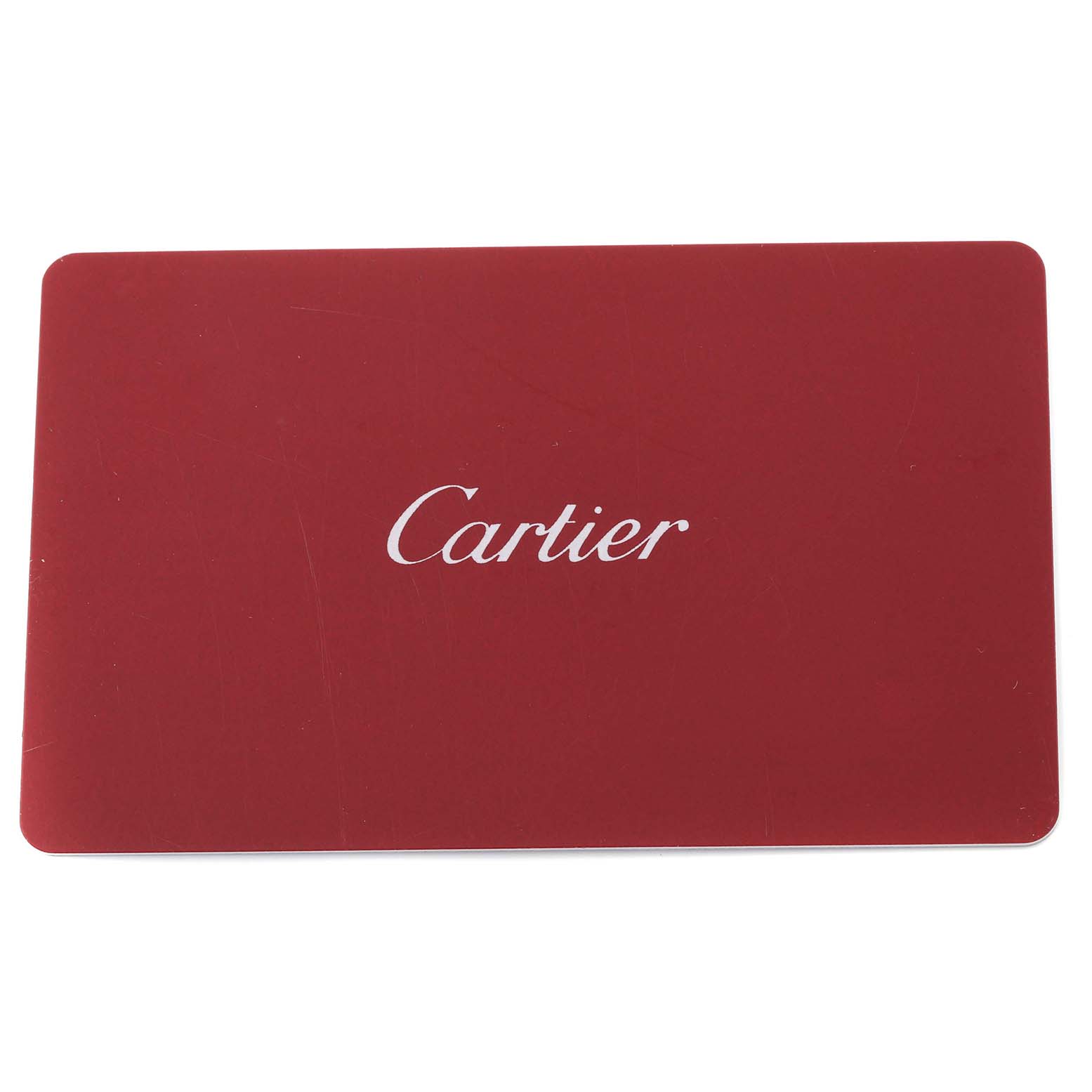 The image shows a red, rectangular Cartier Best Quality
ation card for the Tank Solo model.