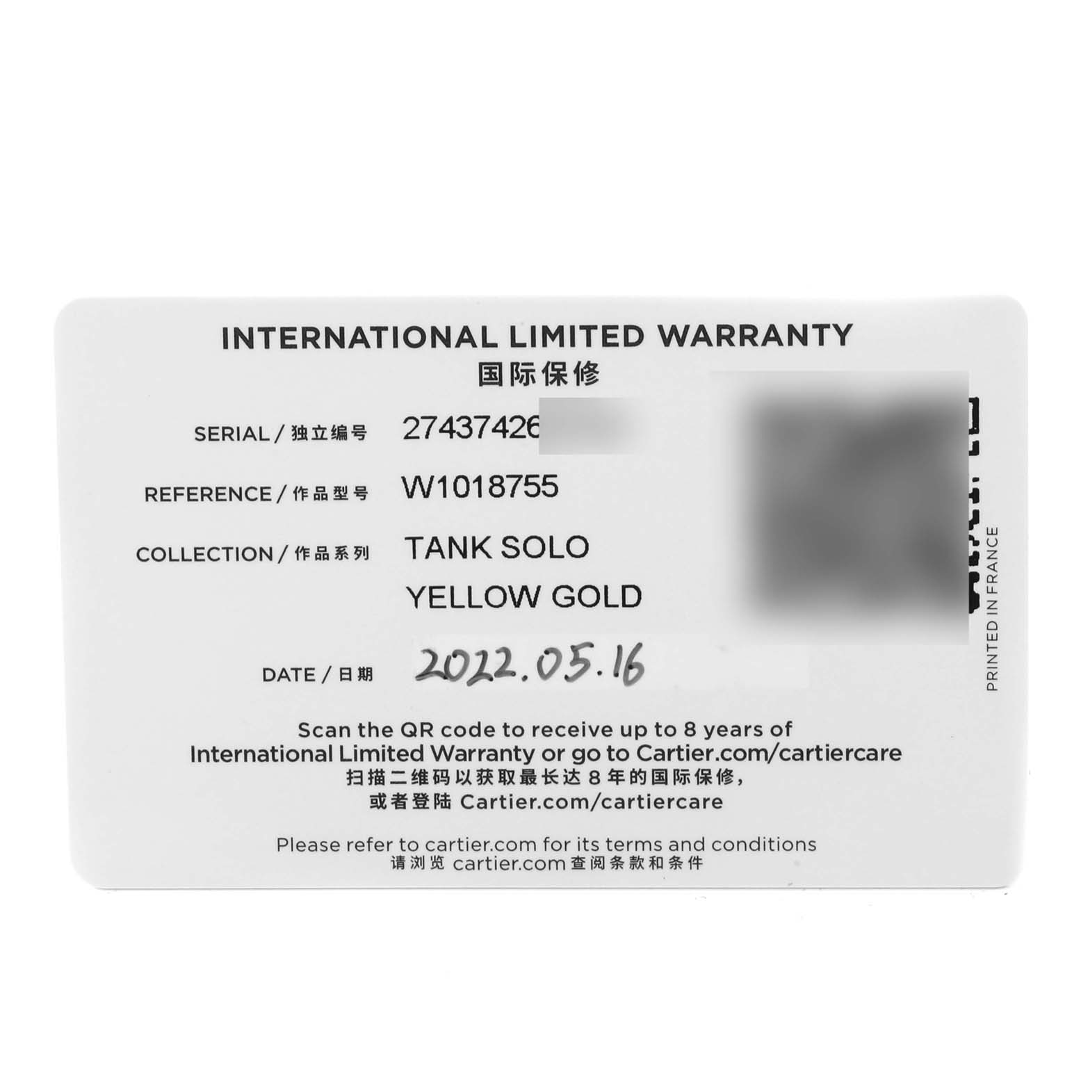 The image shows an International Limited Warranty card for the Cartier Tank Solo W1018755 Women
s Steel and Gold (two tone) Silver Dial W1018755 Women
s Steel and Gold (two tone) Silver Dial model watch.