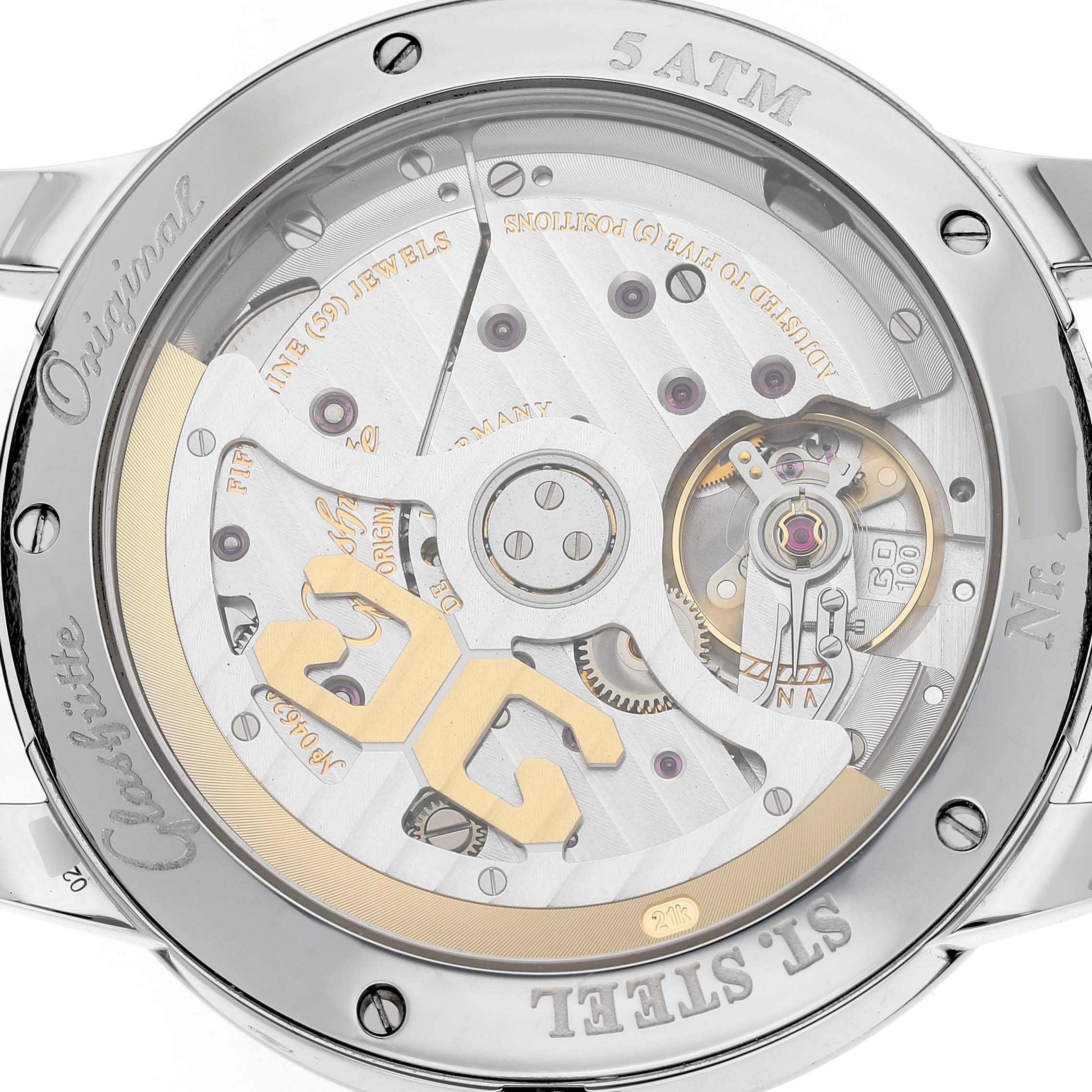 The image shows the case back of a Glashutte Original 100-02-13-02-04 Men's Stainless Steel Silver Dial watch, displaying its intricate mechanical movement.