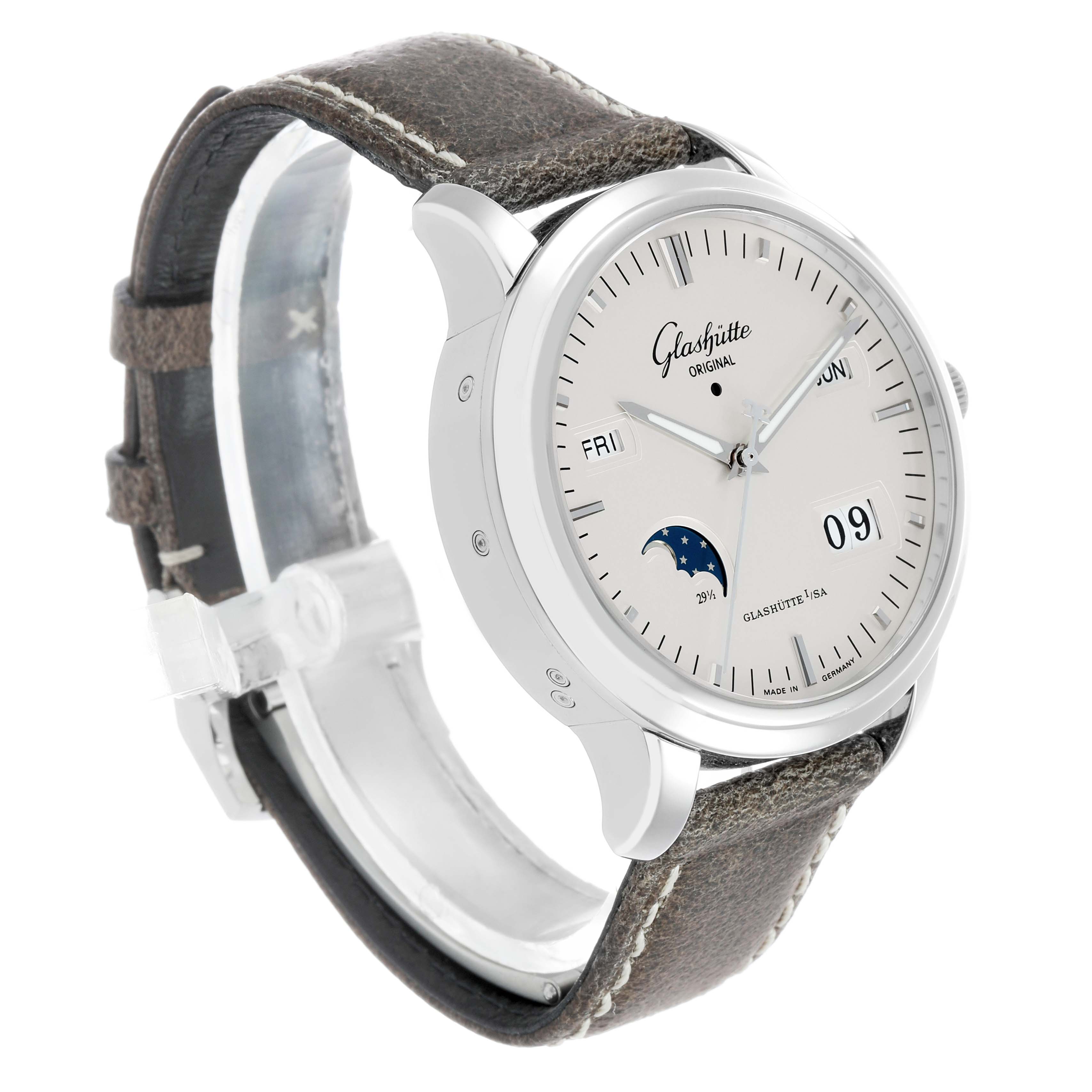 The Glashütte Original watch is shown at a three-quarter angle, highlighting the dial, case, and leather strap.