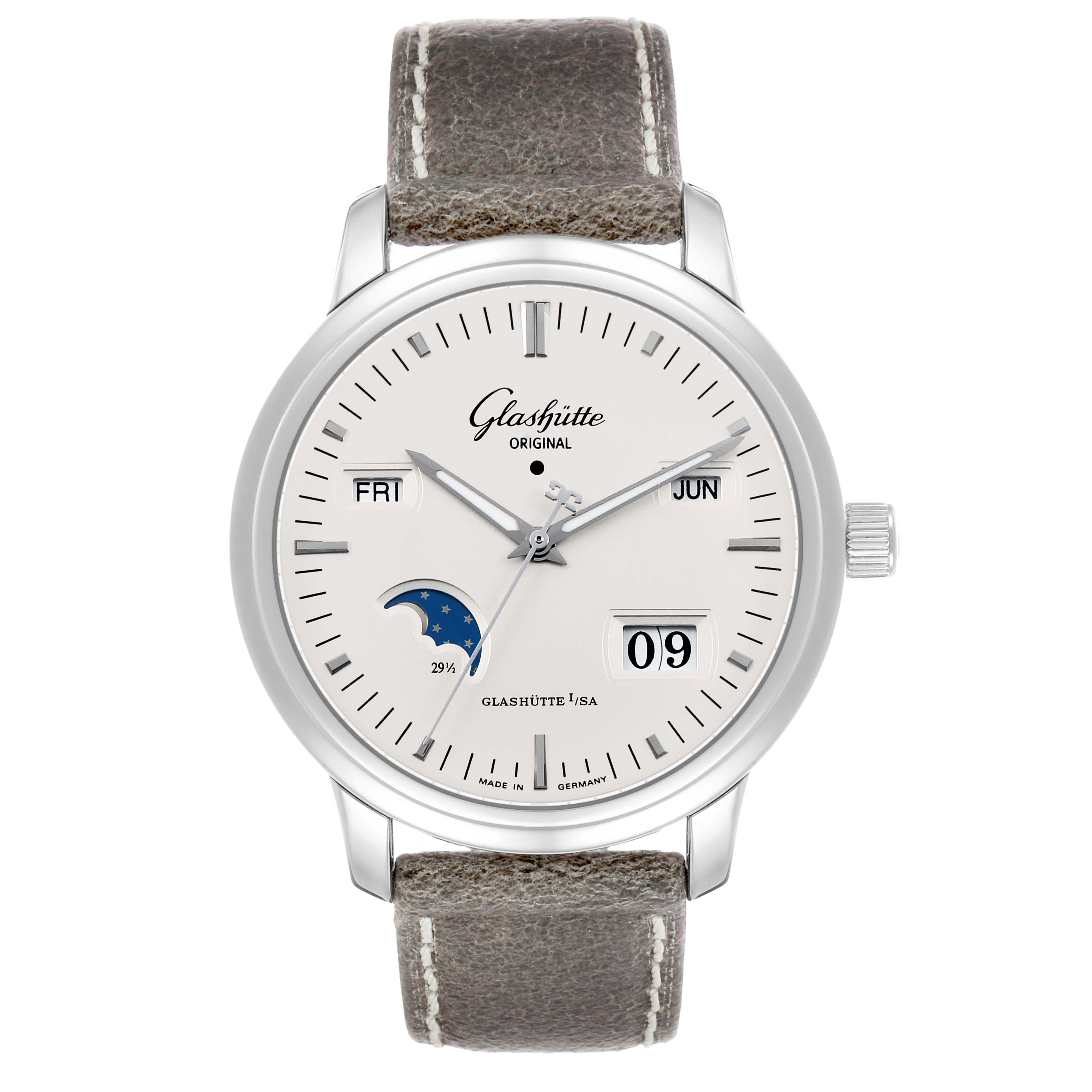 The Glashütte Original watch is shown from a front angle, displaying the dial, hands, date, day, month, and moon phase.