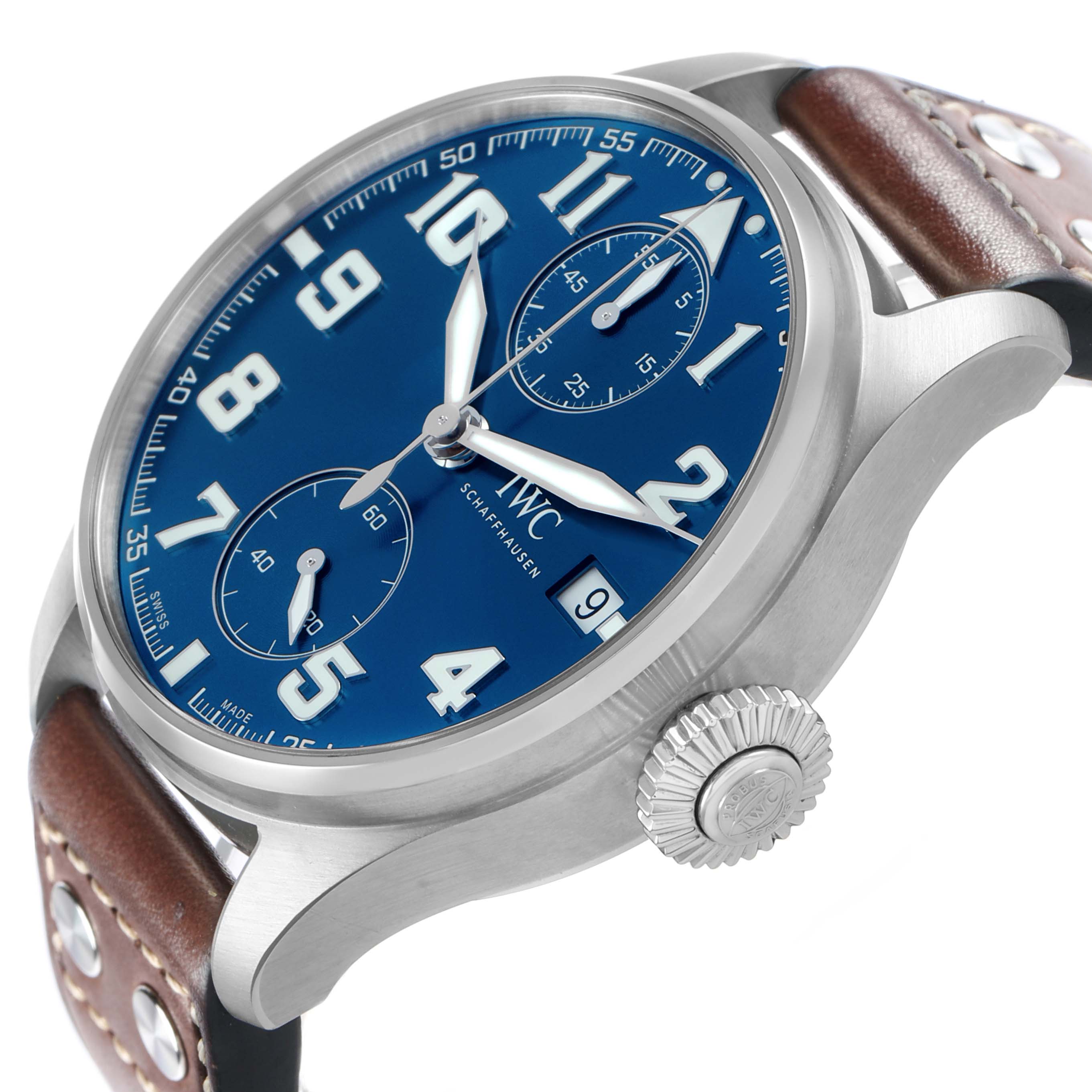 The IWC Pilot IW515202 Men's Stainless Steel Blue Dial model watch is shown at an angled side view, highlighting the blue dial, subdials, crown, and brown leather strap.