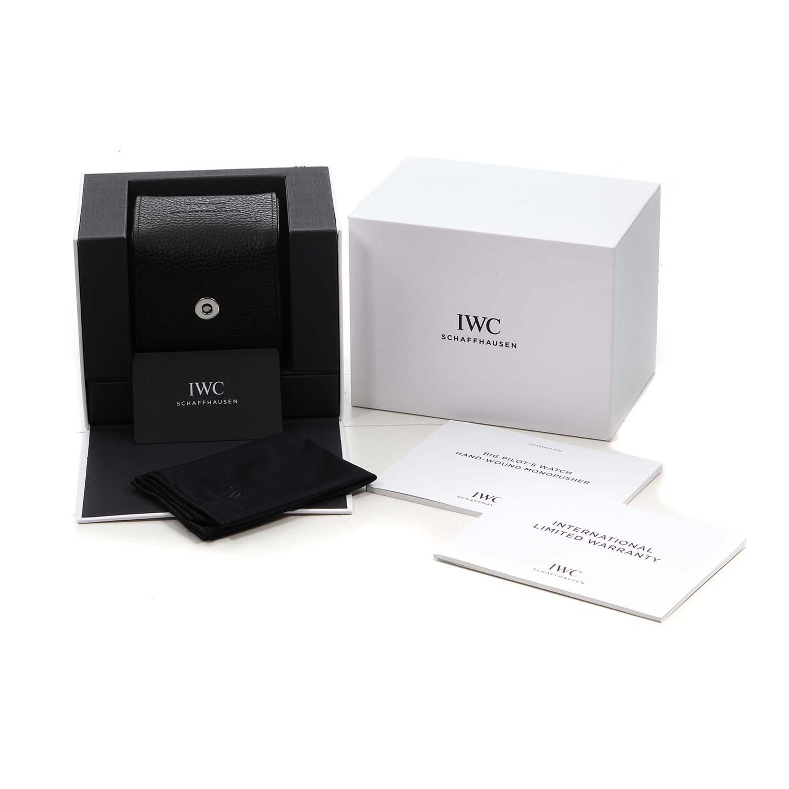 The IWC Pilot IW515202 Men's Stainless Steel Blue Dial watch accessories shown include a black leather case, warranty cards, a cleaning cloth, and an outer box, viewed from the front.